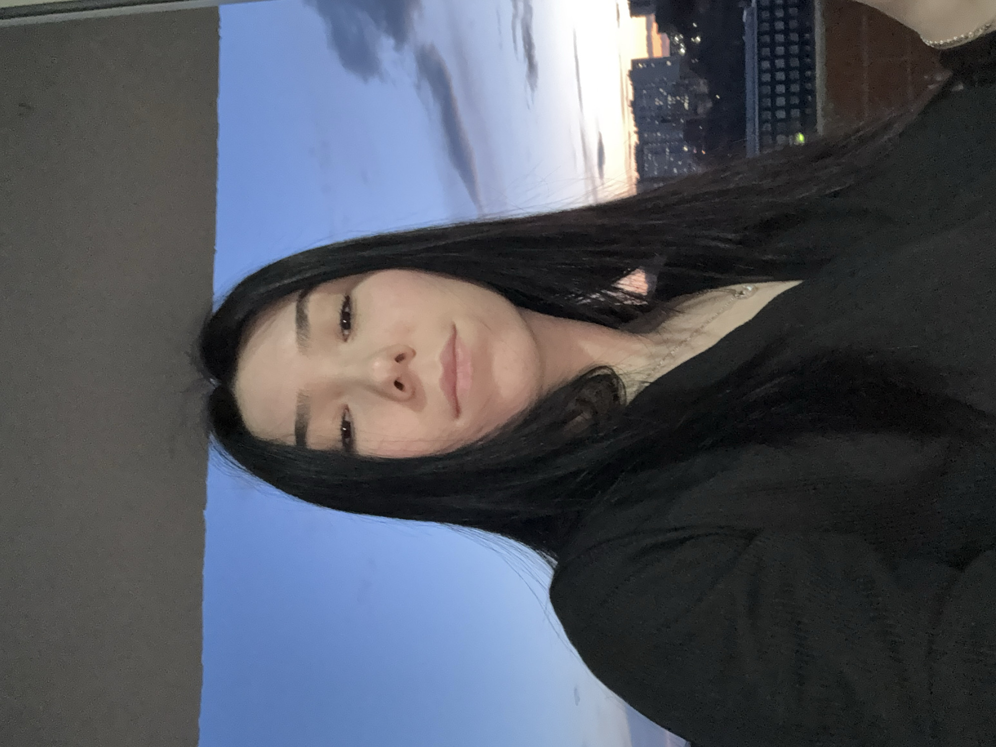 Woman captures quiet evening with cat in Izhevsk twilight