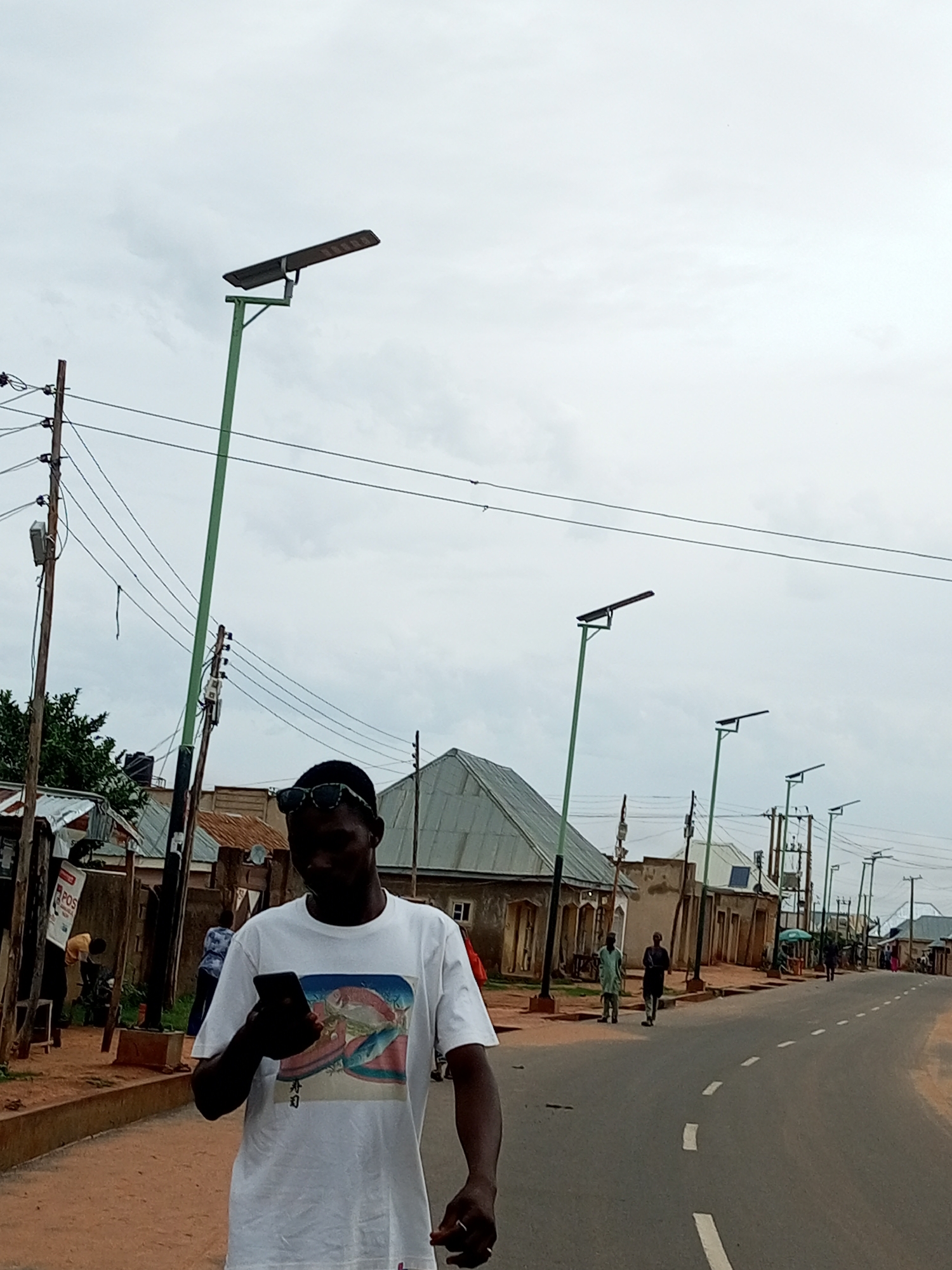 Everyday street and yard activity in Tempure, Nigeria