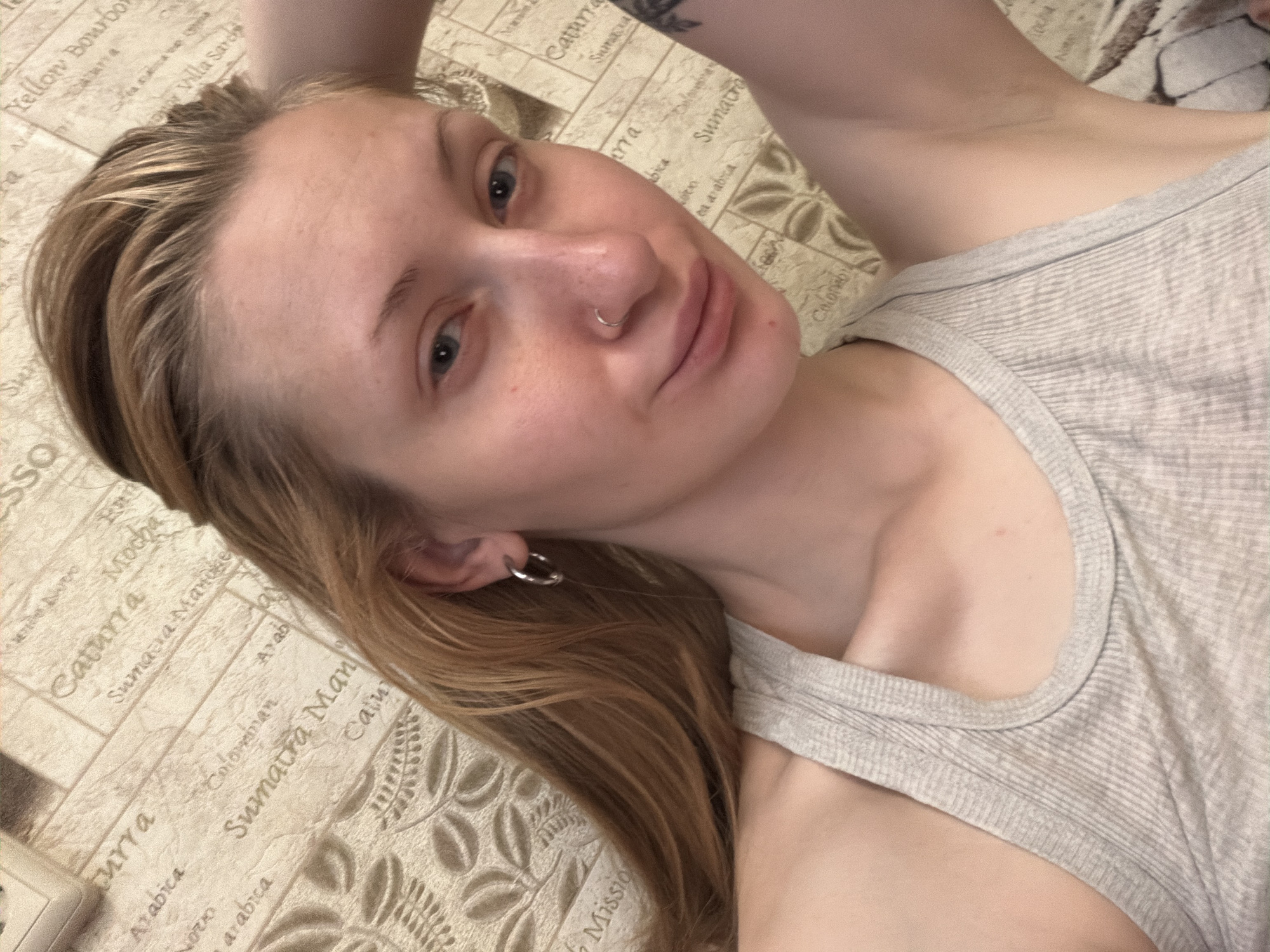 Morning selfie session in a Saint Petersburg bedroom