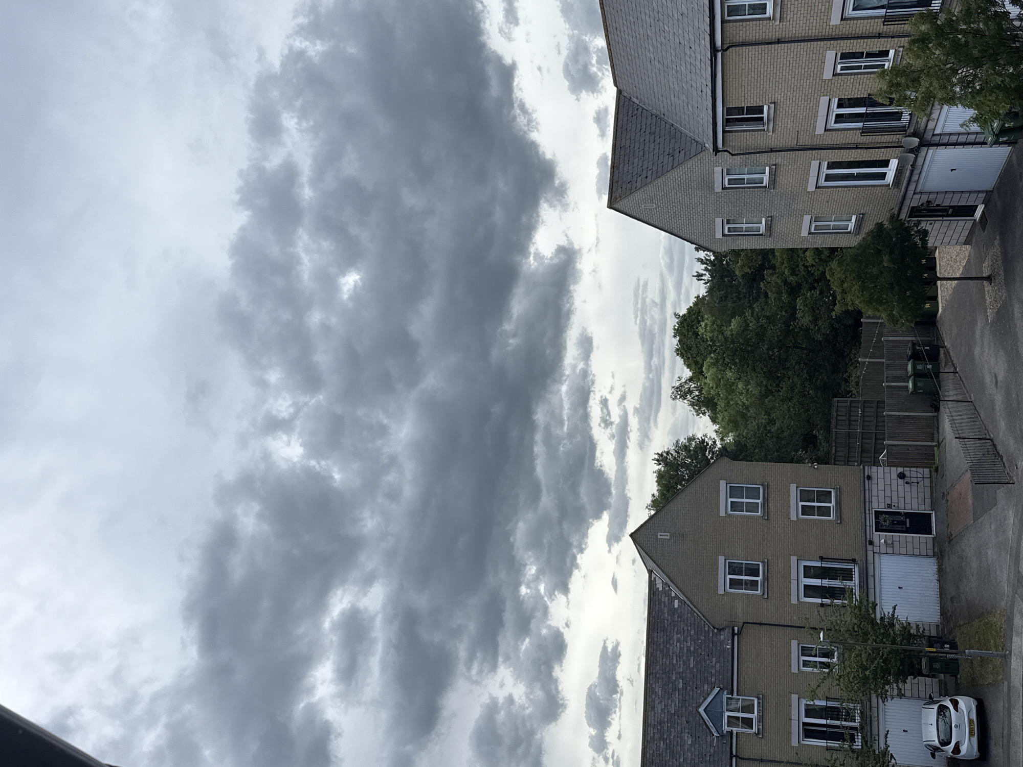 Quiet residential street under cloudy skies in Great Yarmouth