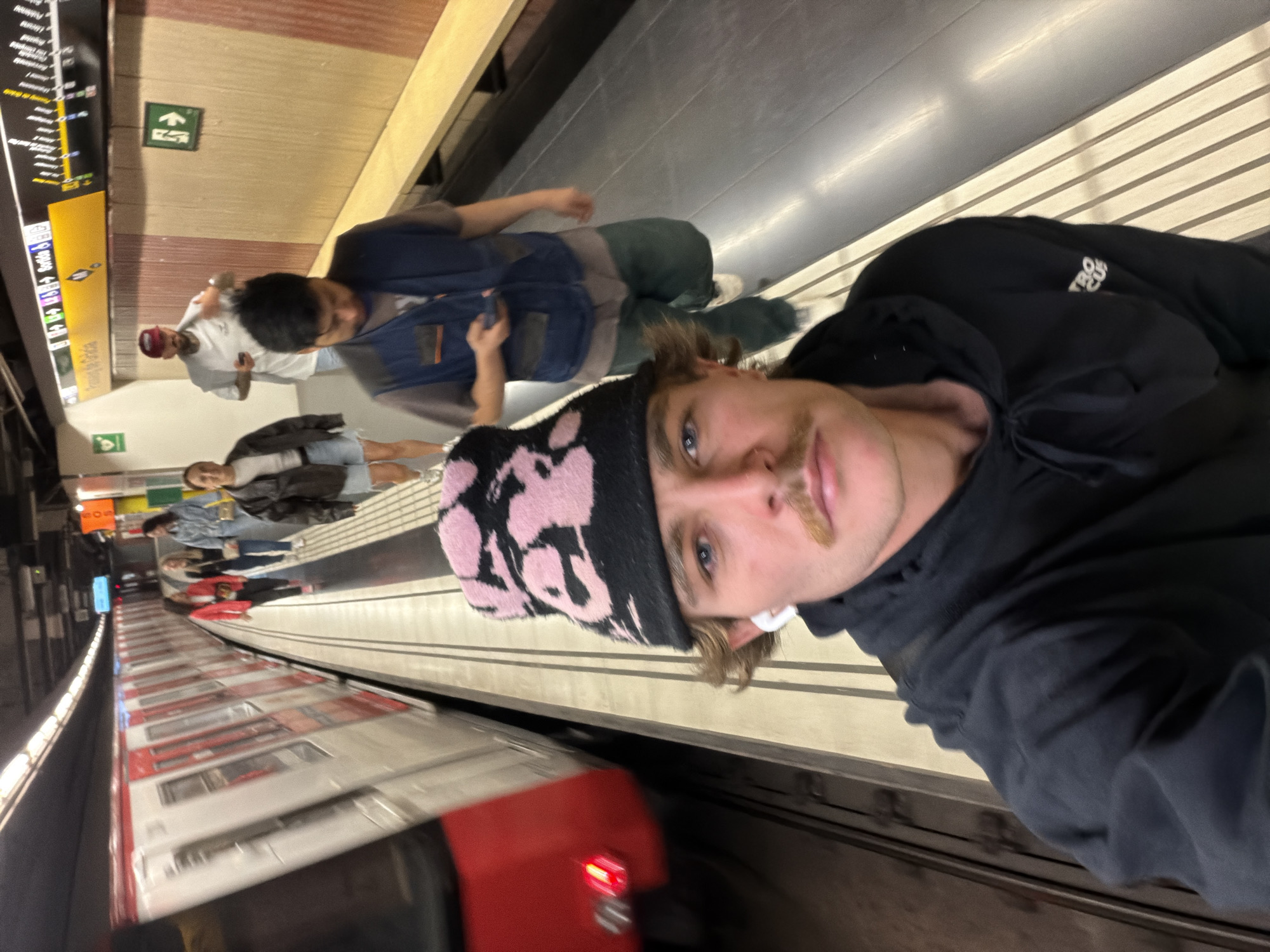 Man documents subway journey with selfie, rests on train