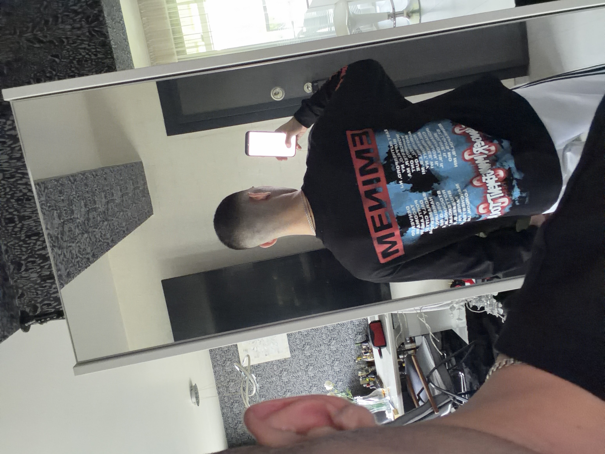 Man takes mirror selfie in Bulgarian home