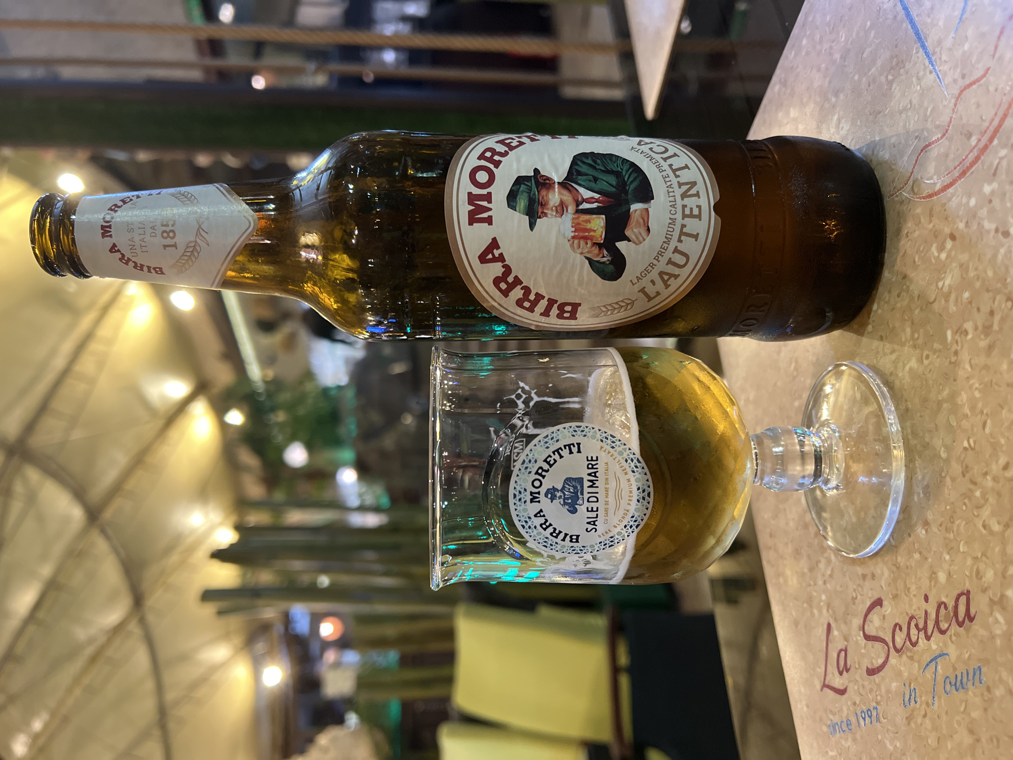 Watching World Cup matches over Birra Moretti at a Constanța terrace