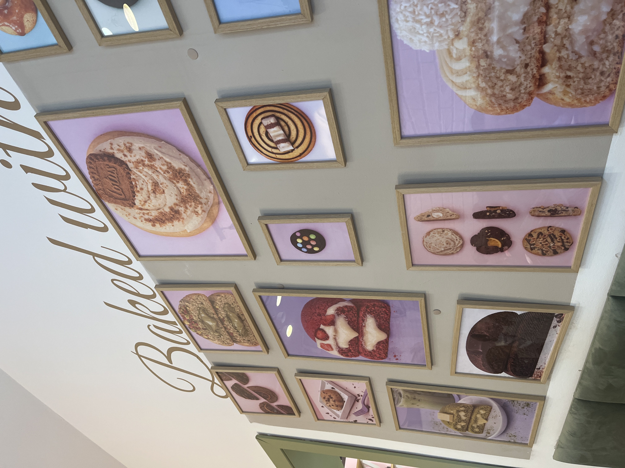 Cookie café visit documented in Krakow with displays and signage