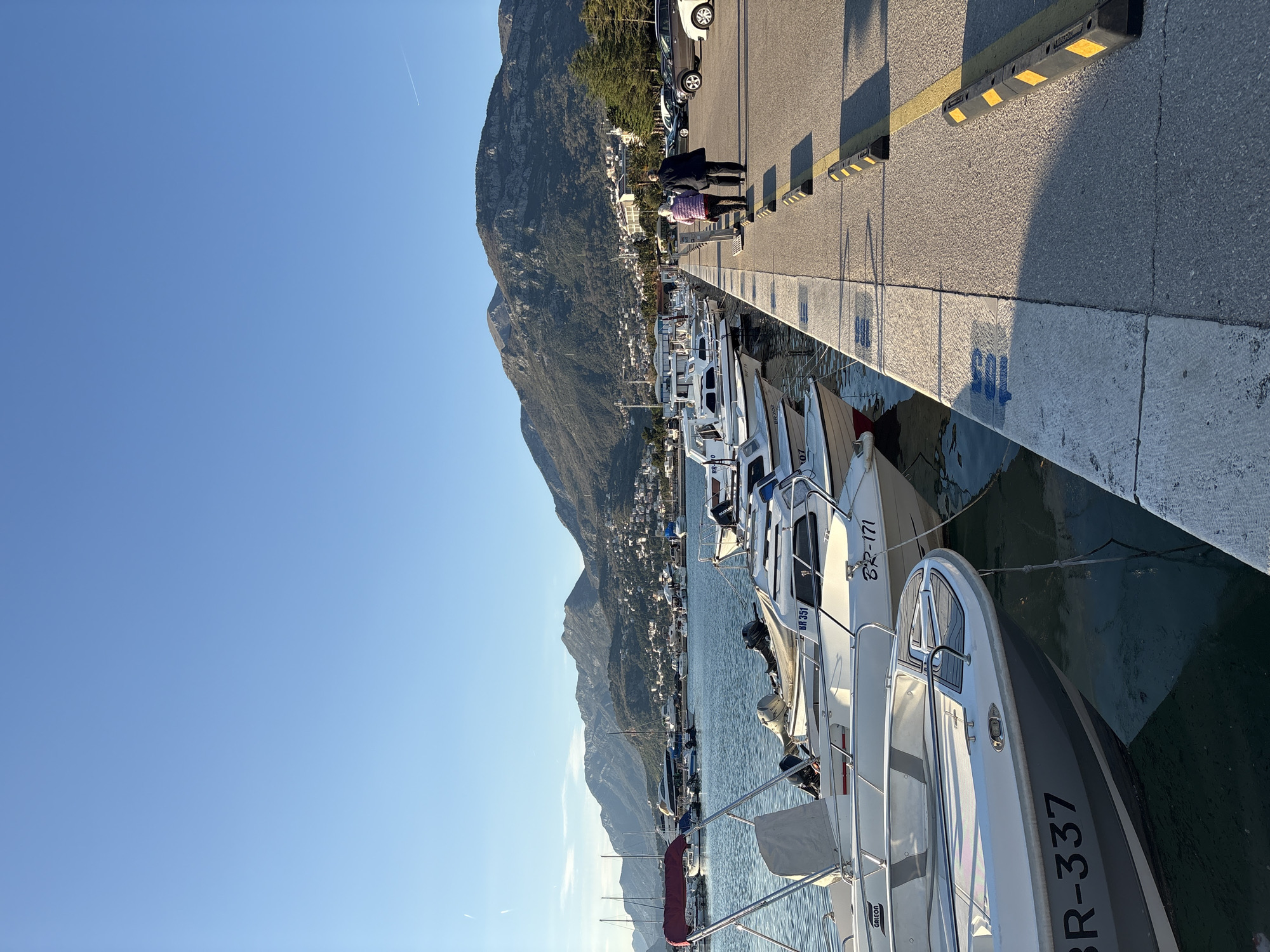 Two people observed at Bar Montenegro harbor waterfront