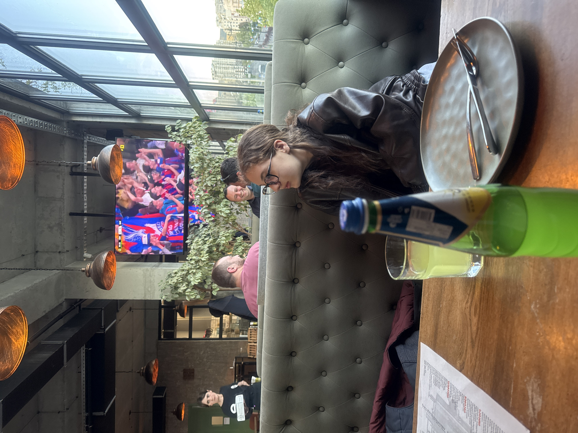 Woman dines at modern restaurant in Tbilisi