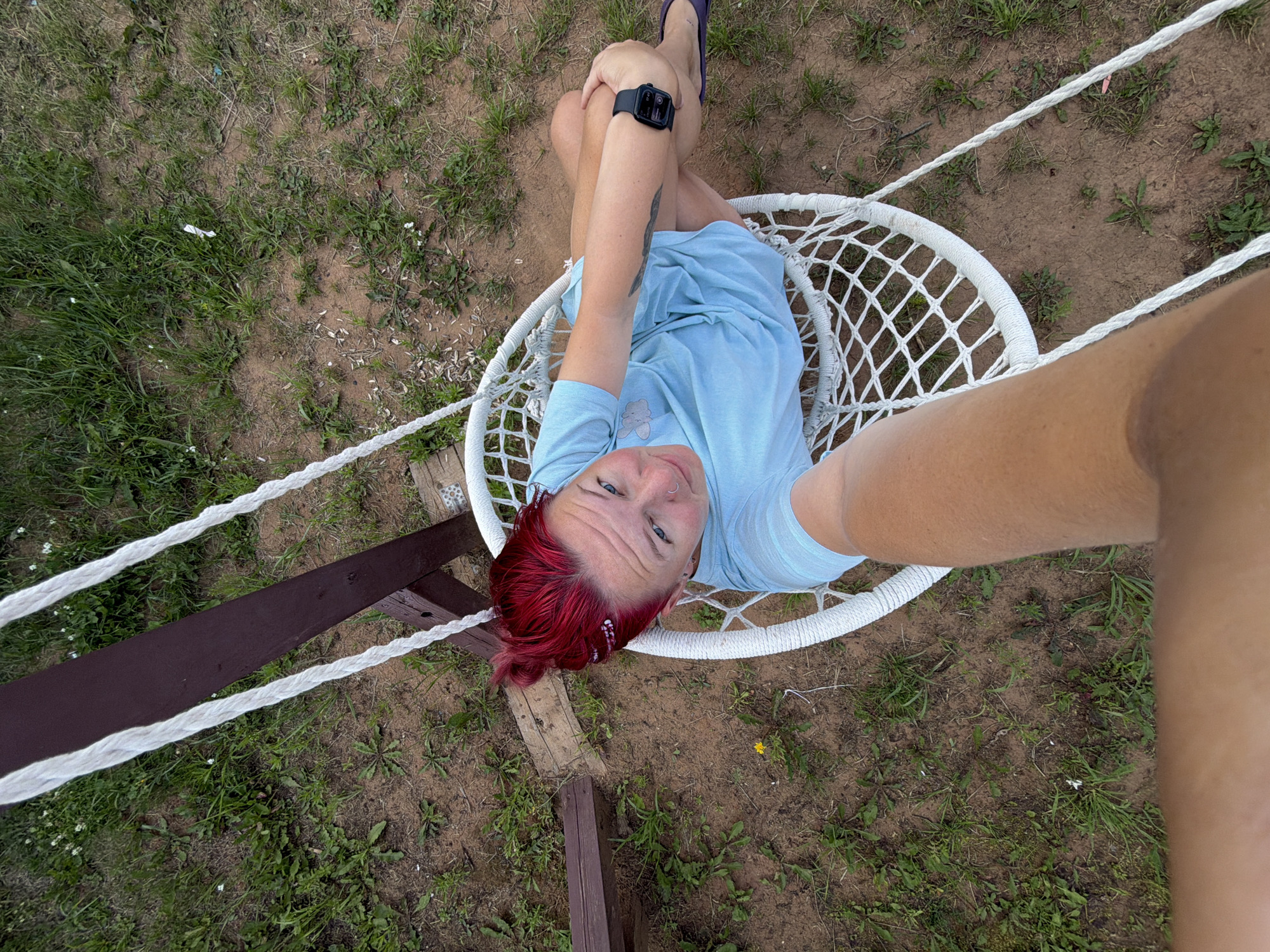 Backyard afternoon in Chaikovsky: hammocks, kids, and sunny play