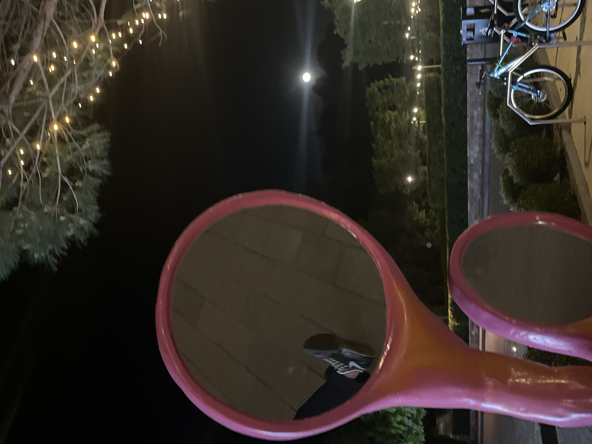 Nighttime stroll through illuminated Tivat captures public art and streetscapes