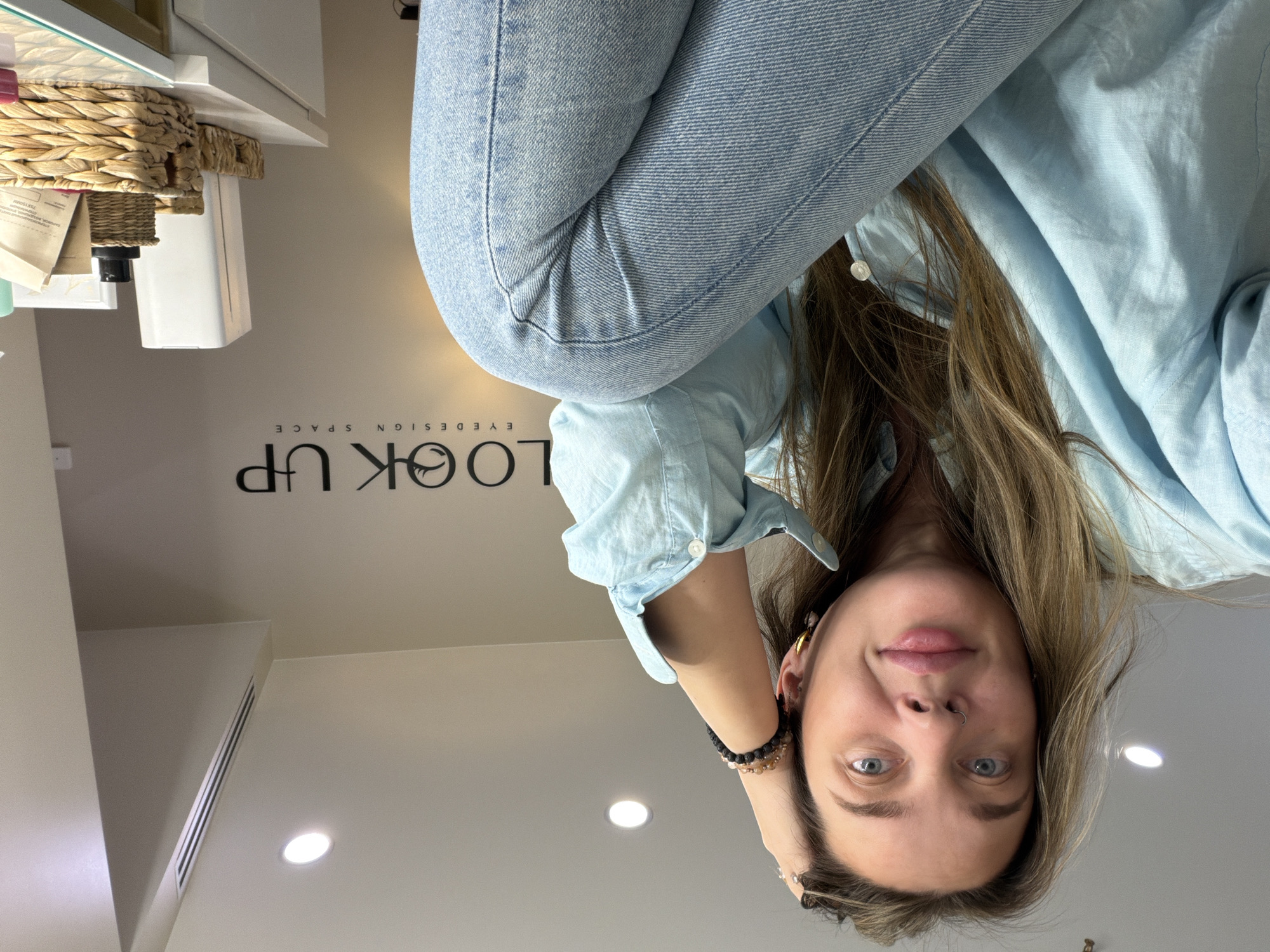 Young woman in denim observed in Moscow