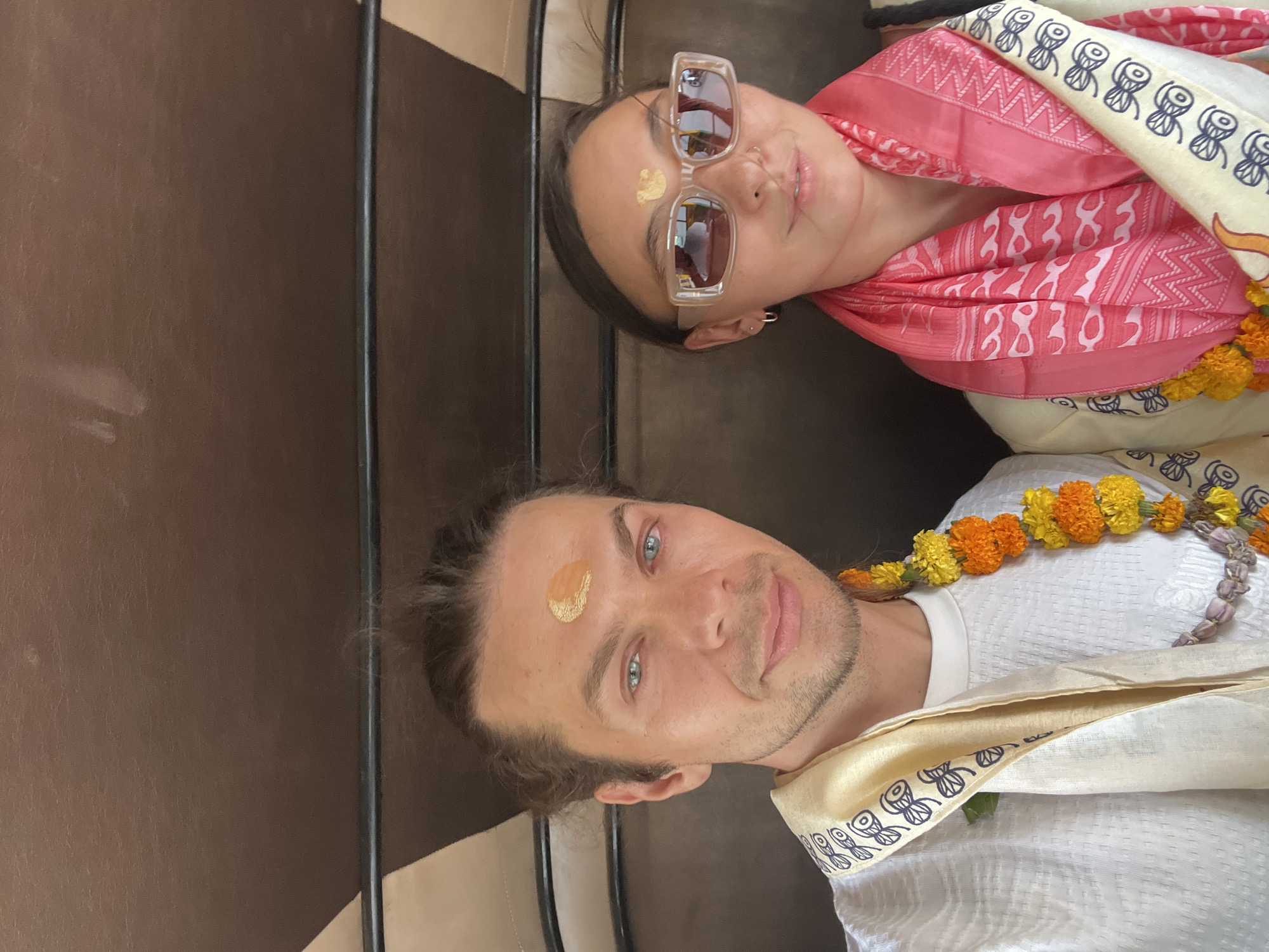 Tourists pose for selfies in auto-rickshaw in Varanasi