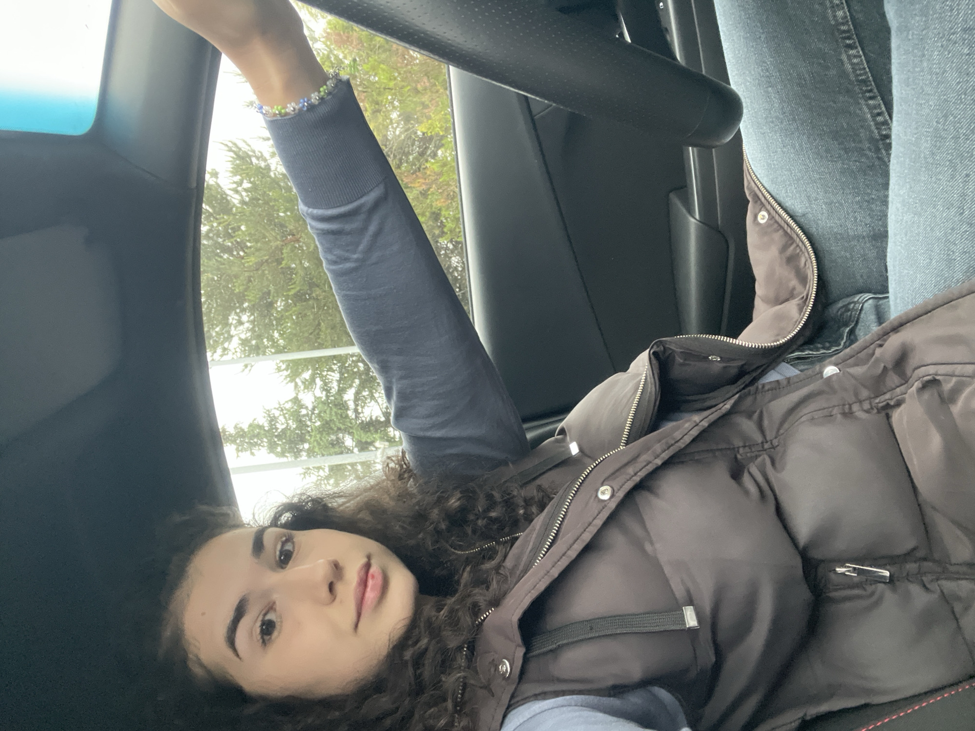Woman takes early morning car selfies in Sofia