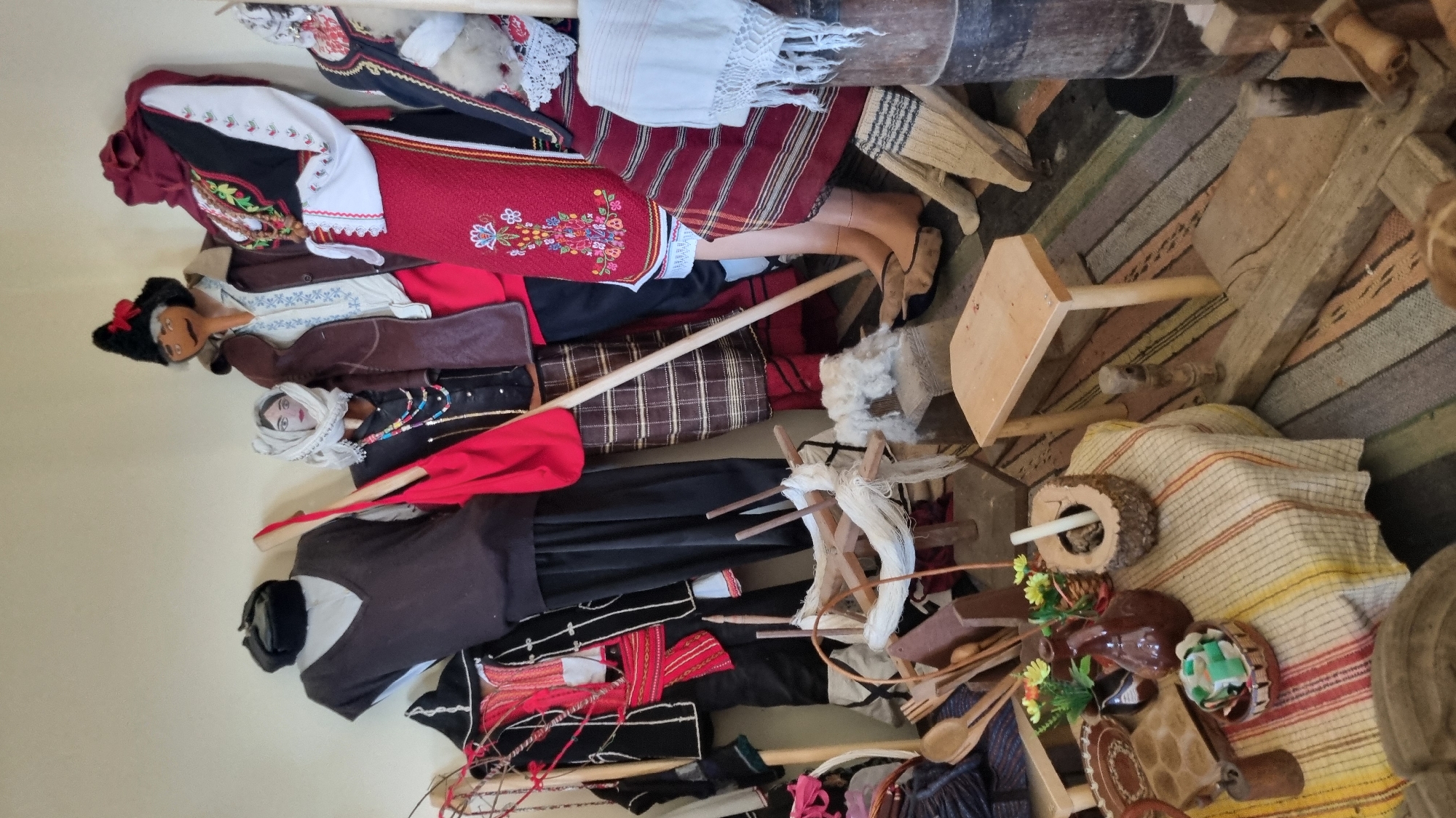 Museum display of traditional dolls observed by witness