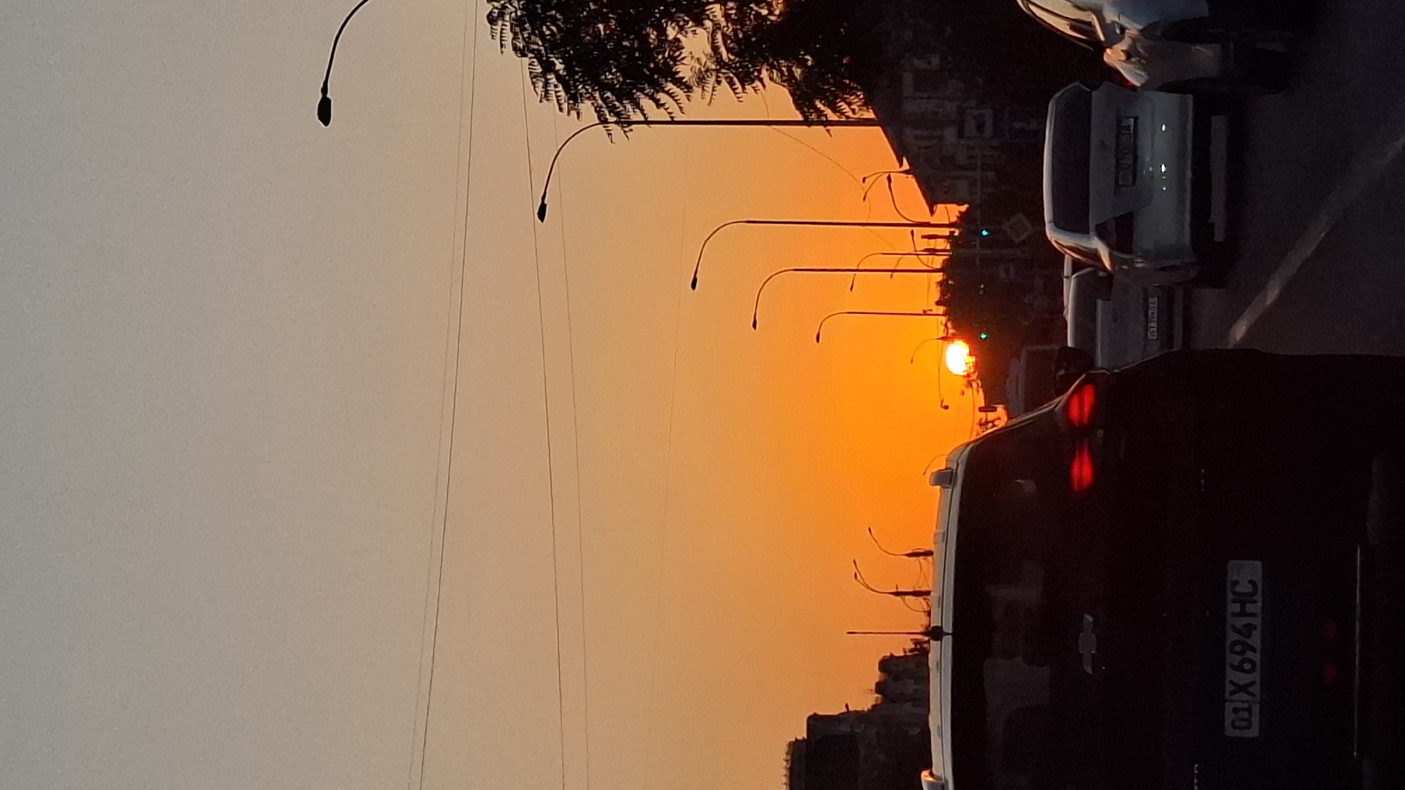 Urban streets at golden hour, shot from the road