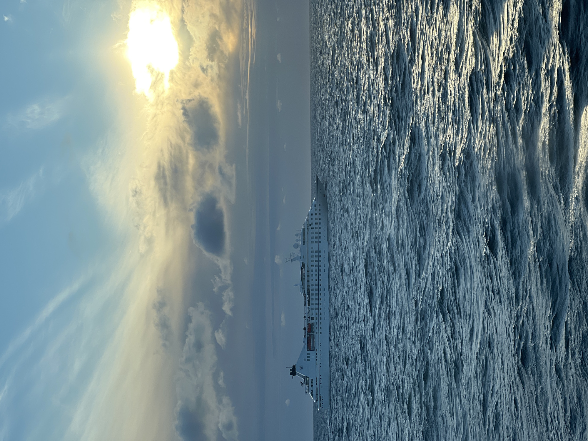 Cruise ship sailing the Baltic under a partly cloudy sky