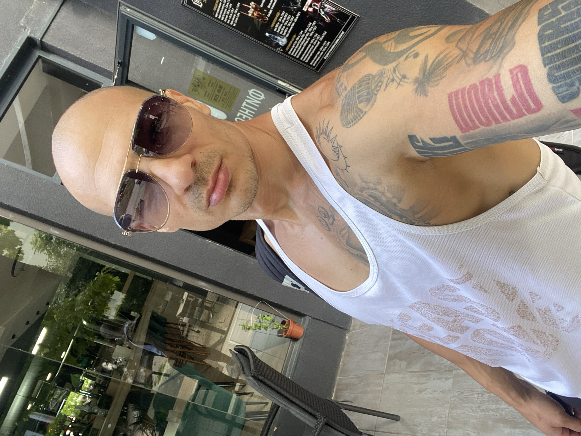 Selfie session at a Pleven café, tattoos and all
