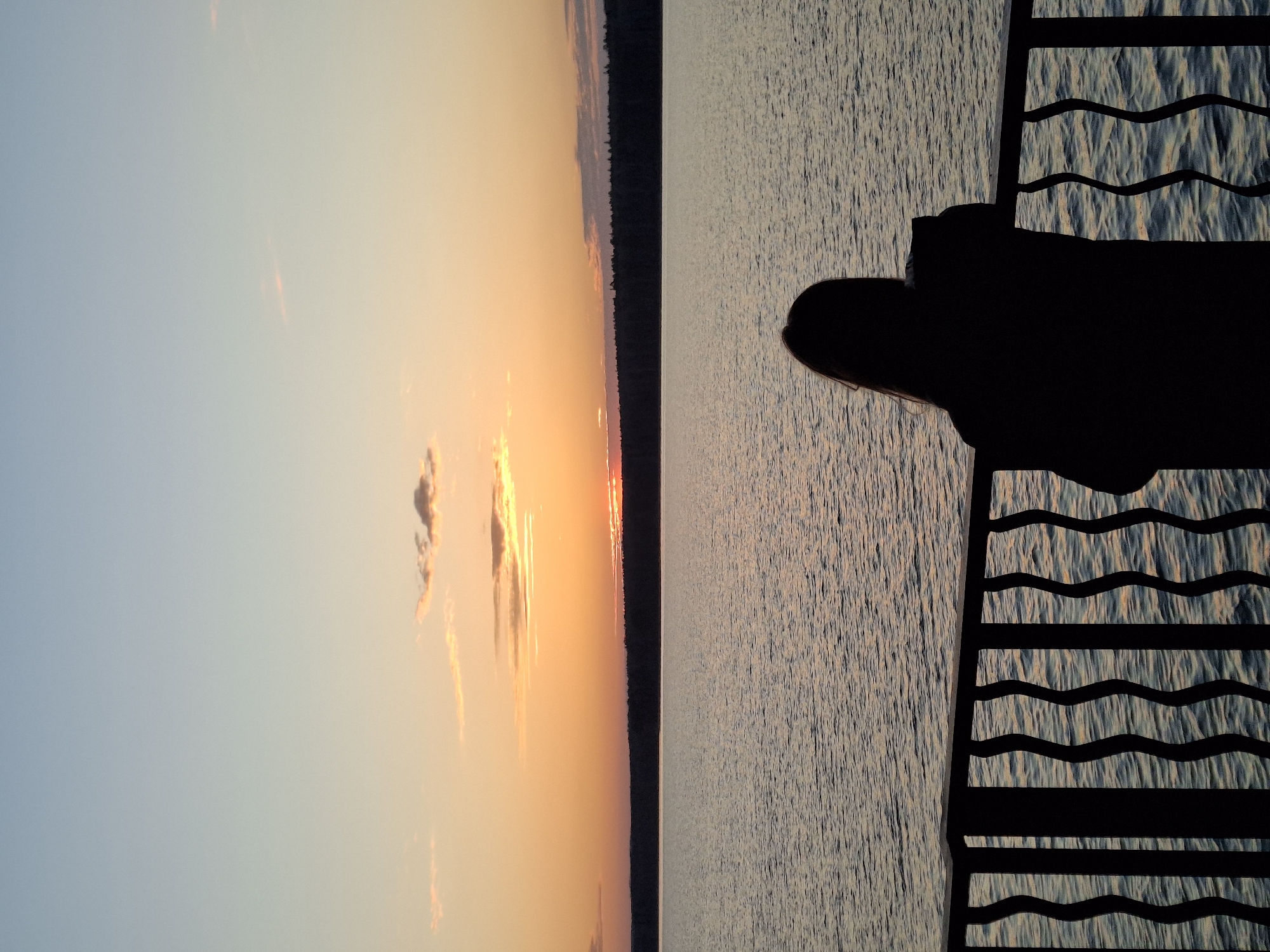 Peaceful sunset moments captured along Chaikovsky lakefront, Russia