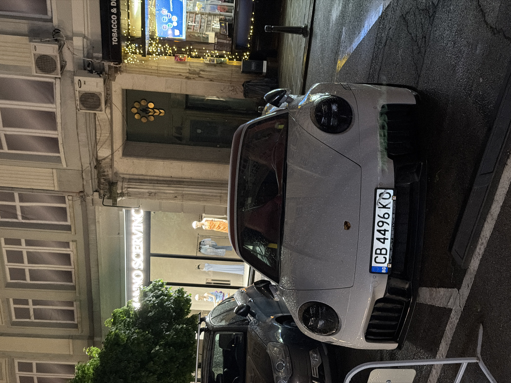 Rainy evening scene documented in Sofia's illuminated historic district