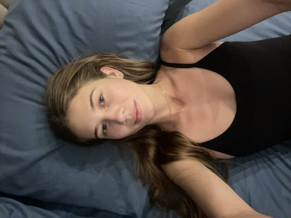 Woman photographed in multiple poses in Khimki bedroom