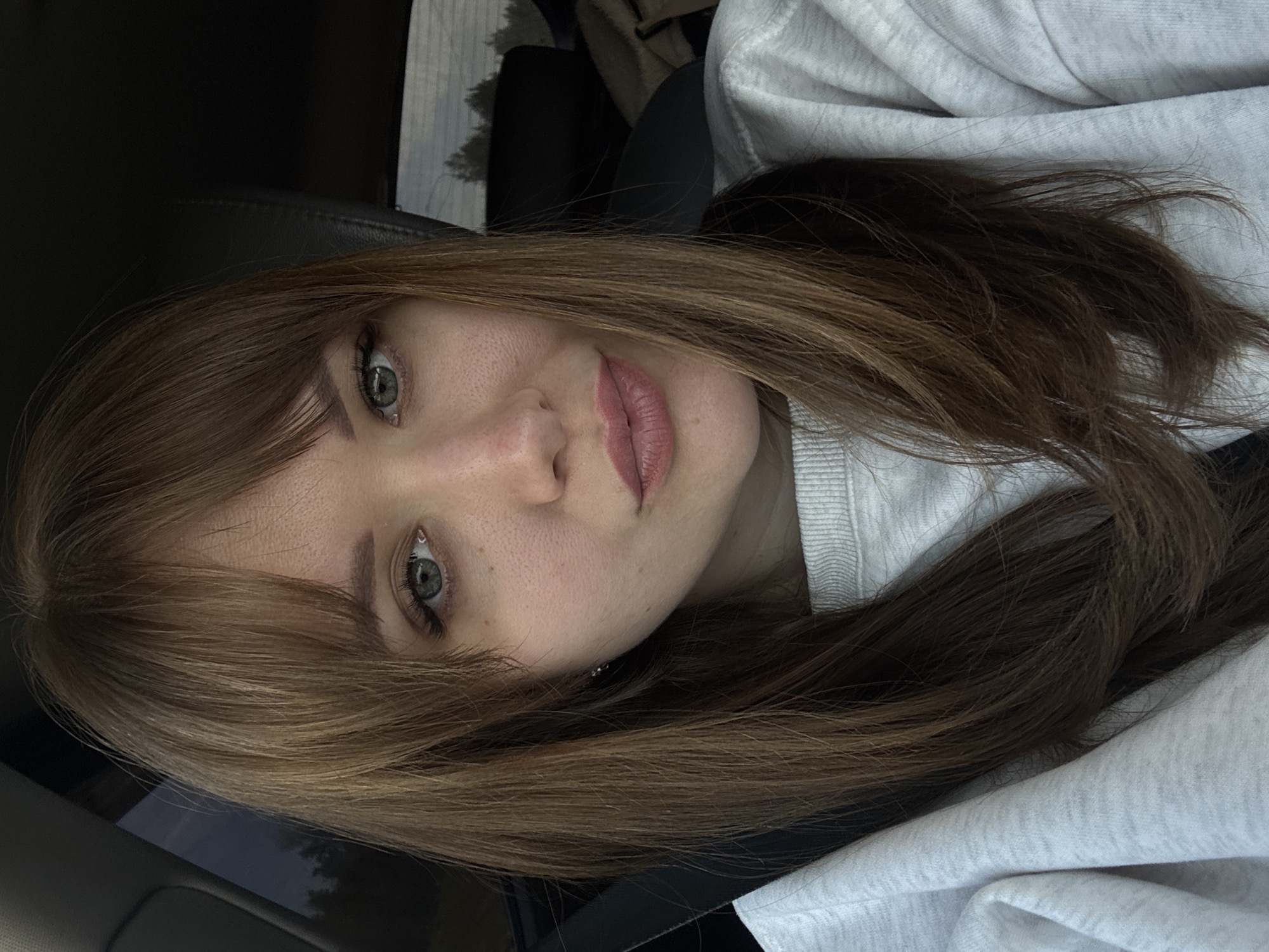 Woman takes car selfie in Егорьево, Russia