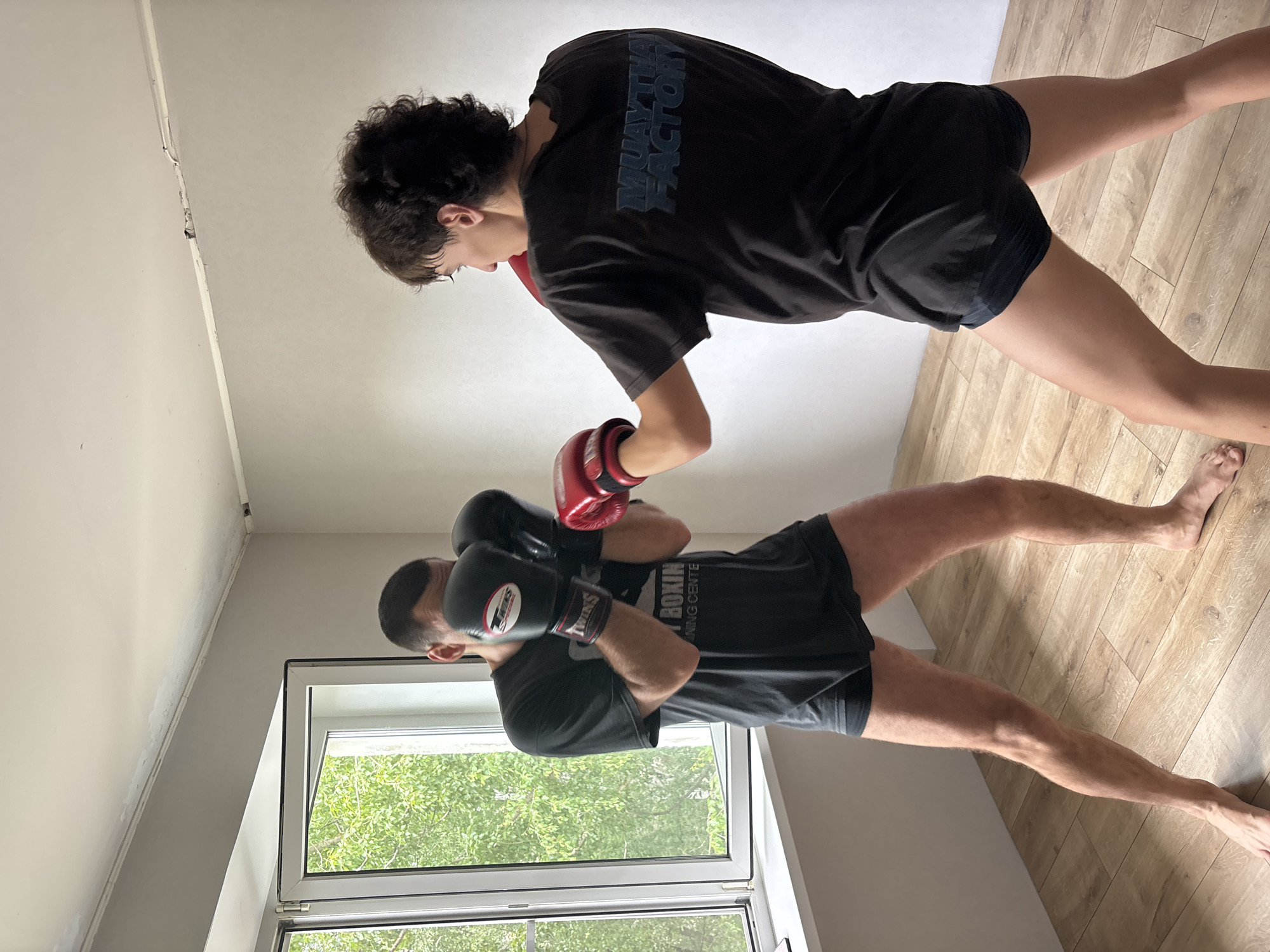 Boxing training session captured indoors in Chaikovsky, Russia