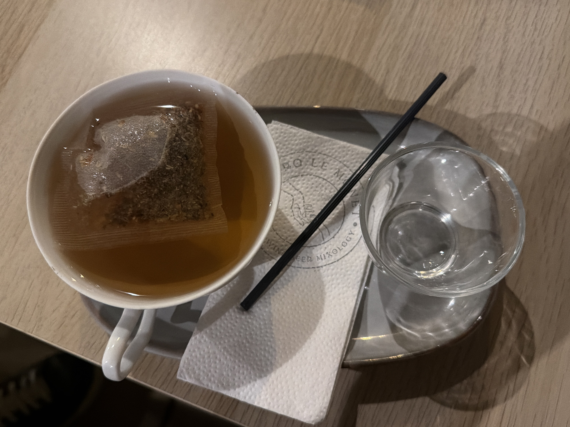 Tea service observed at cafe location during early morning