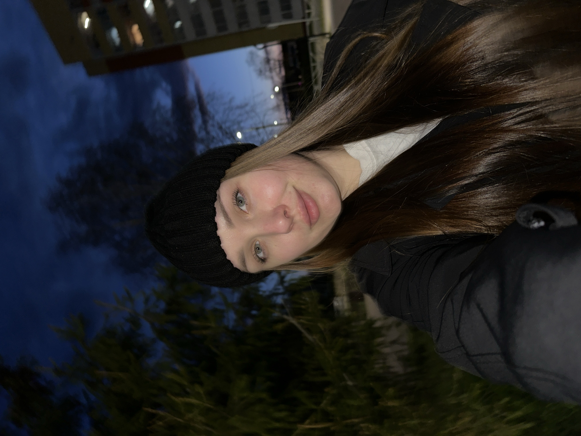 Woman documents evening photo session in Chaikovsky, Russia