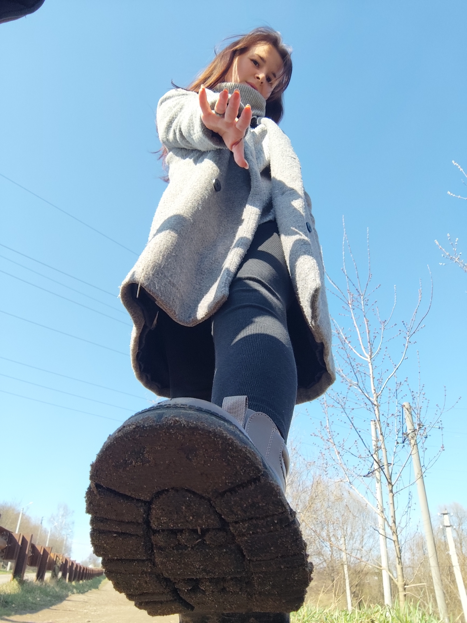 Woman photographed outdoors in Фоки, Russia under spring skies