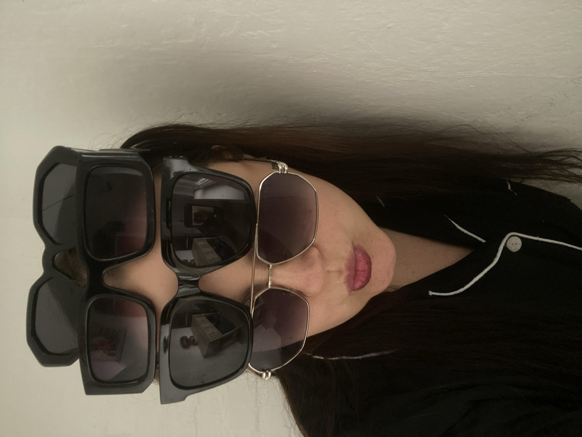 Woman rests wearing hexagonal sunglasses in Sochi