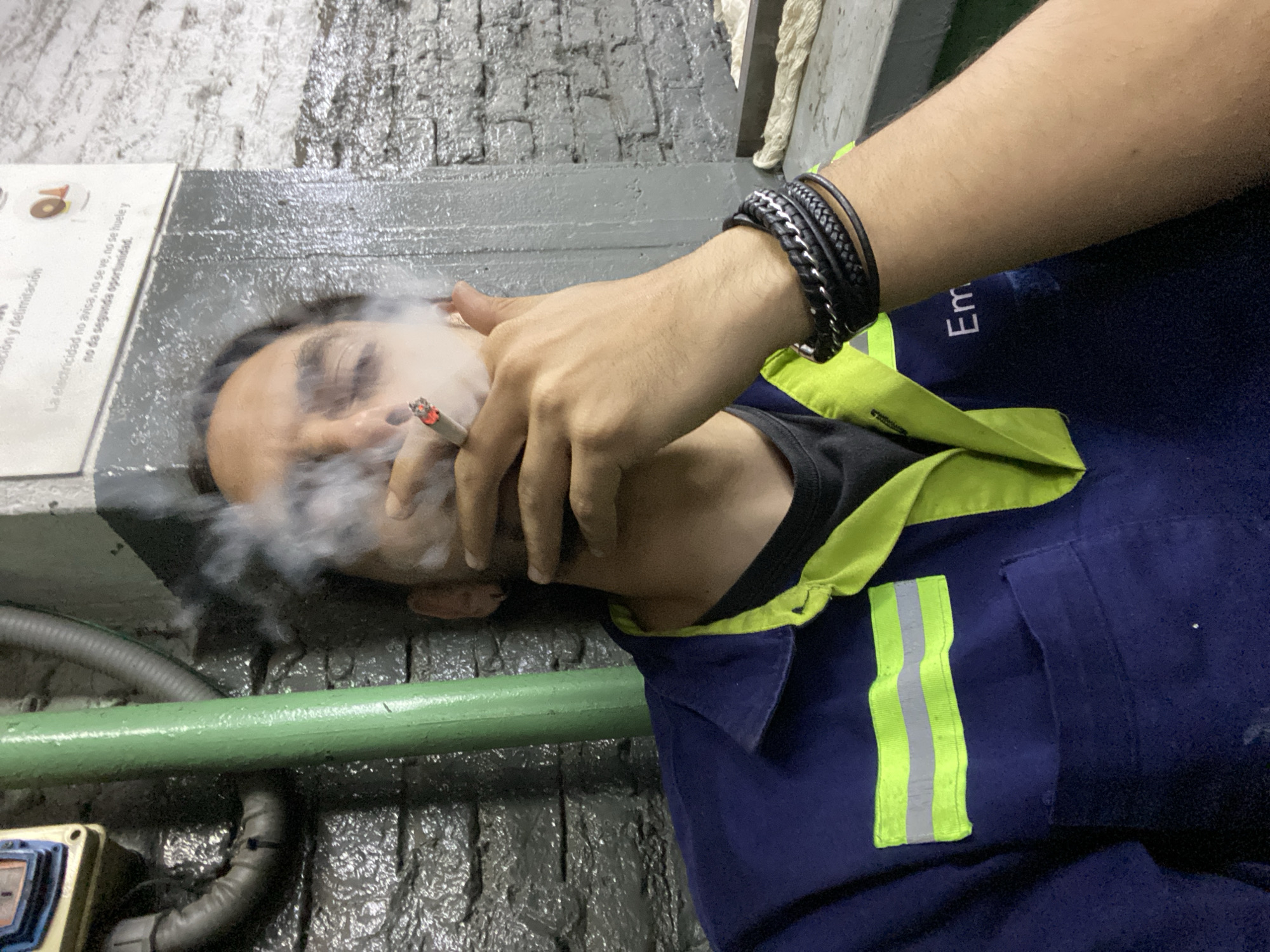 Worker takes smoking break in Buenos Aires