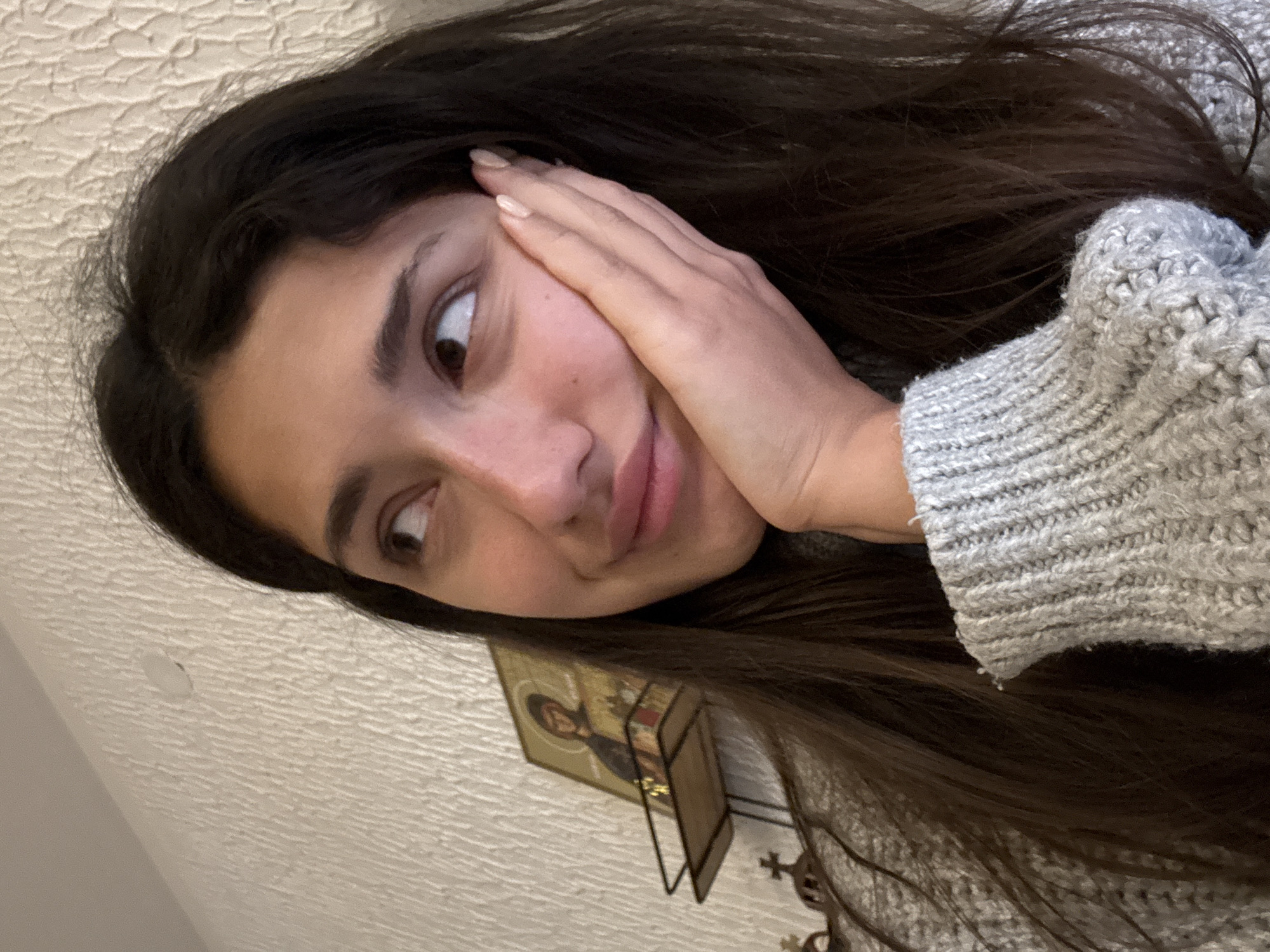 Woman takes morning selfies with dog in Montenegro home