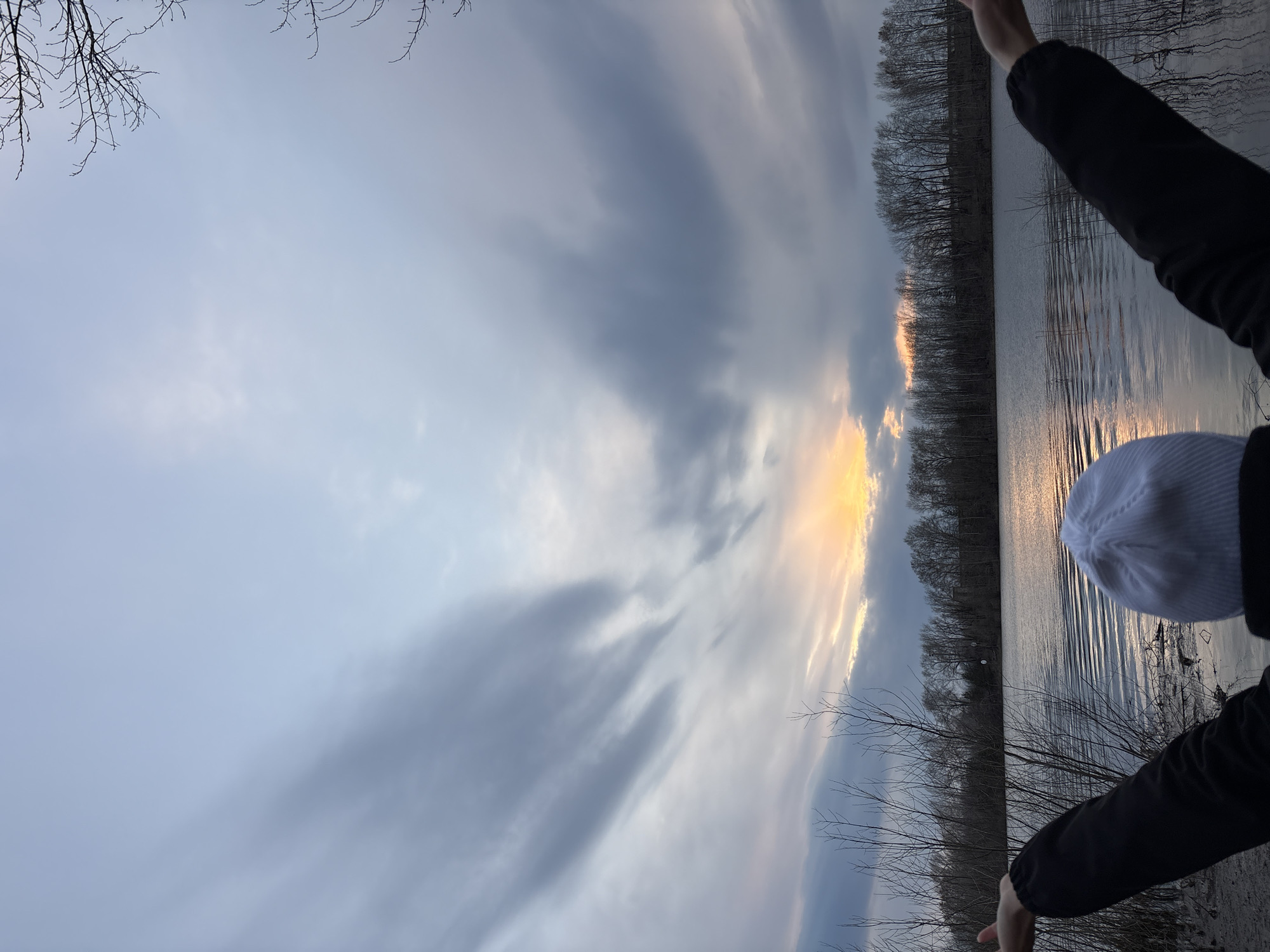 Peaceful sunset captured over water in Chaikovsky, Russia