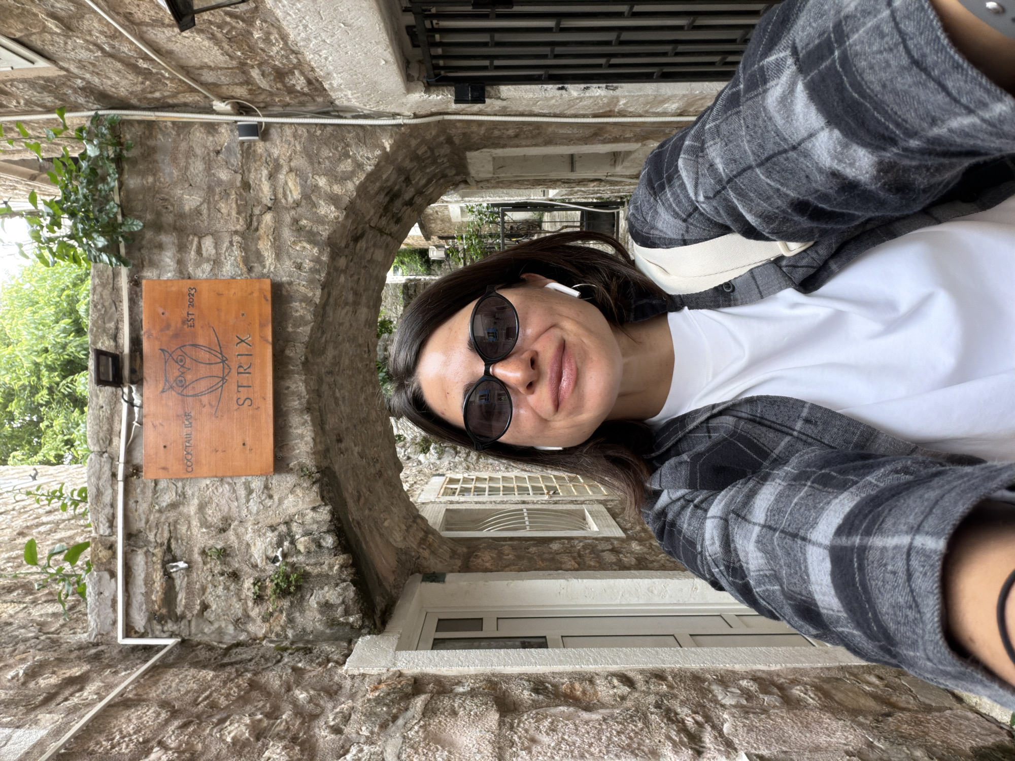 Morning street life captured in Budva's historic Old Town