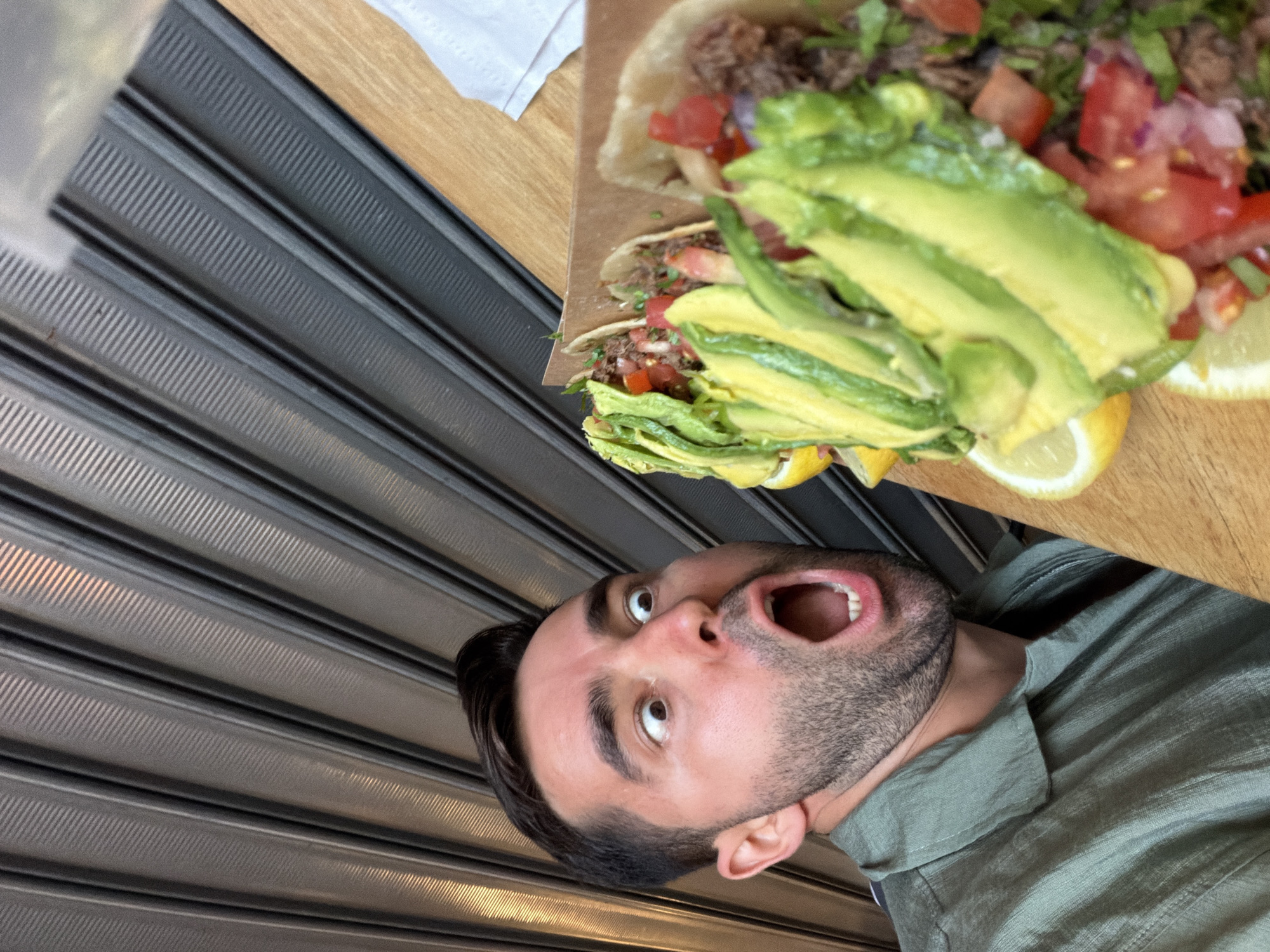 Man shows animated surprise expression in Tel Aviv moment