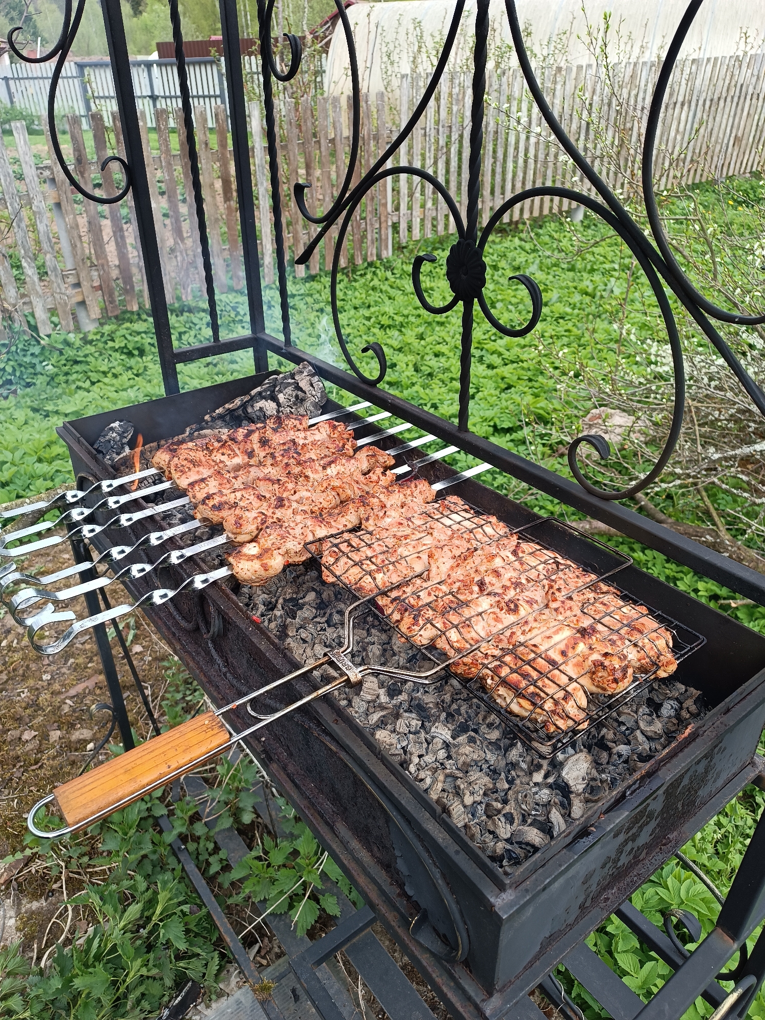 Outdoor barbecue grill spotted in Krasnoarmeysk backyard setting