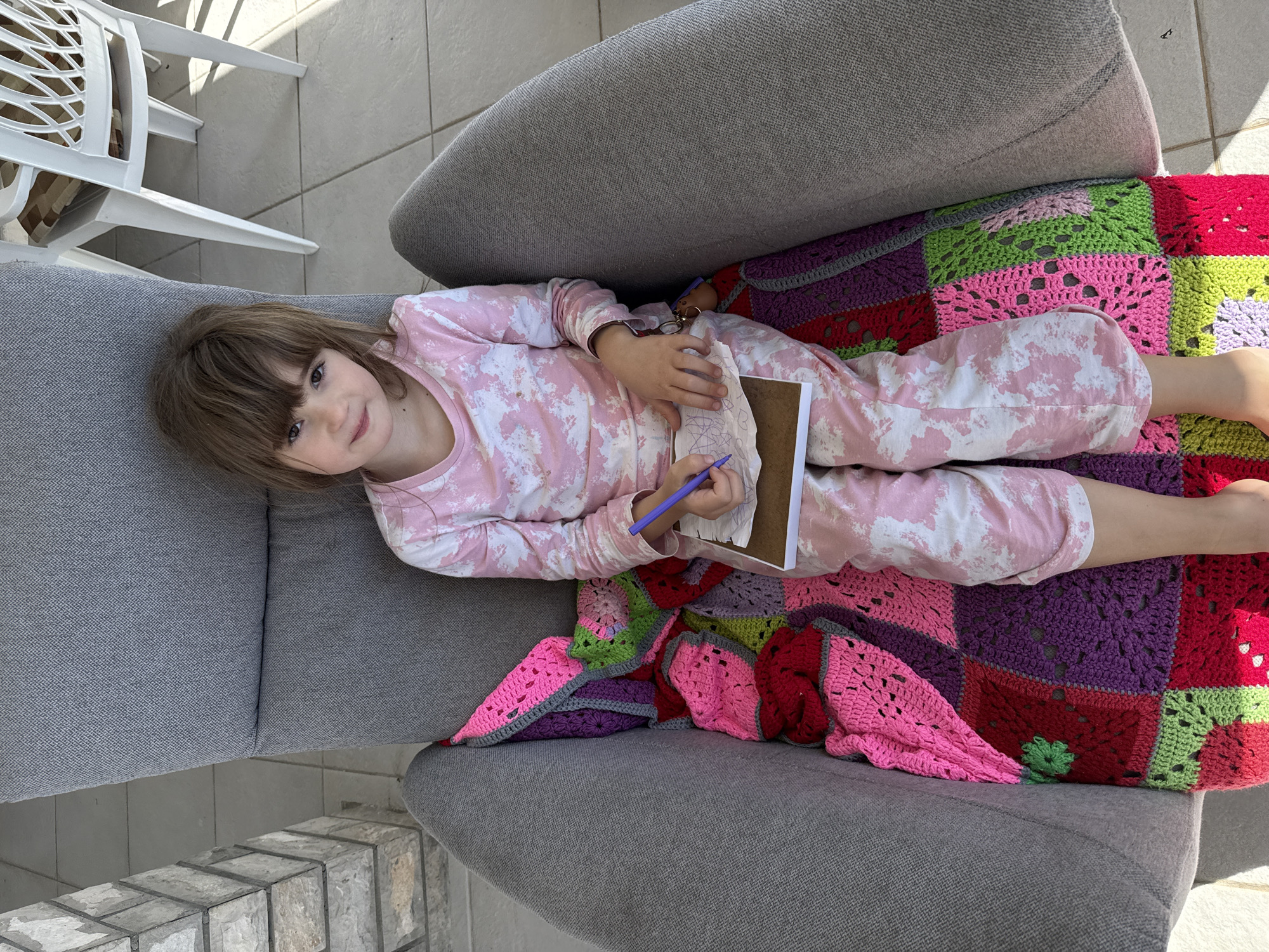 Mother and daughter enjoy quiet morning on Montenegro balcony