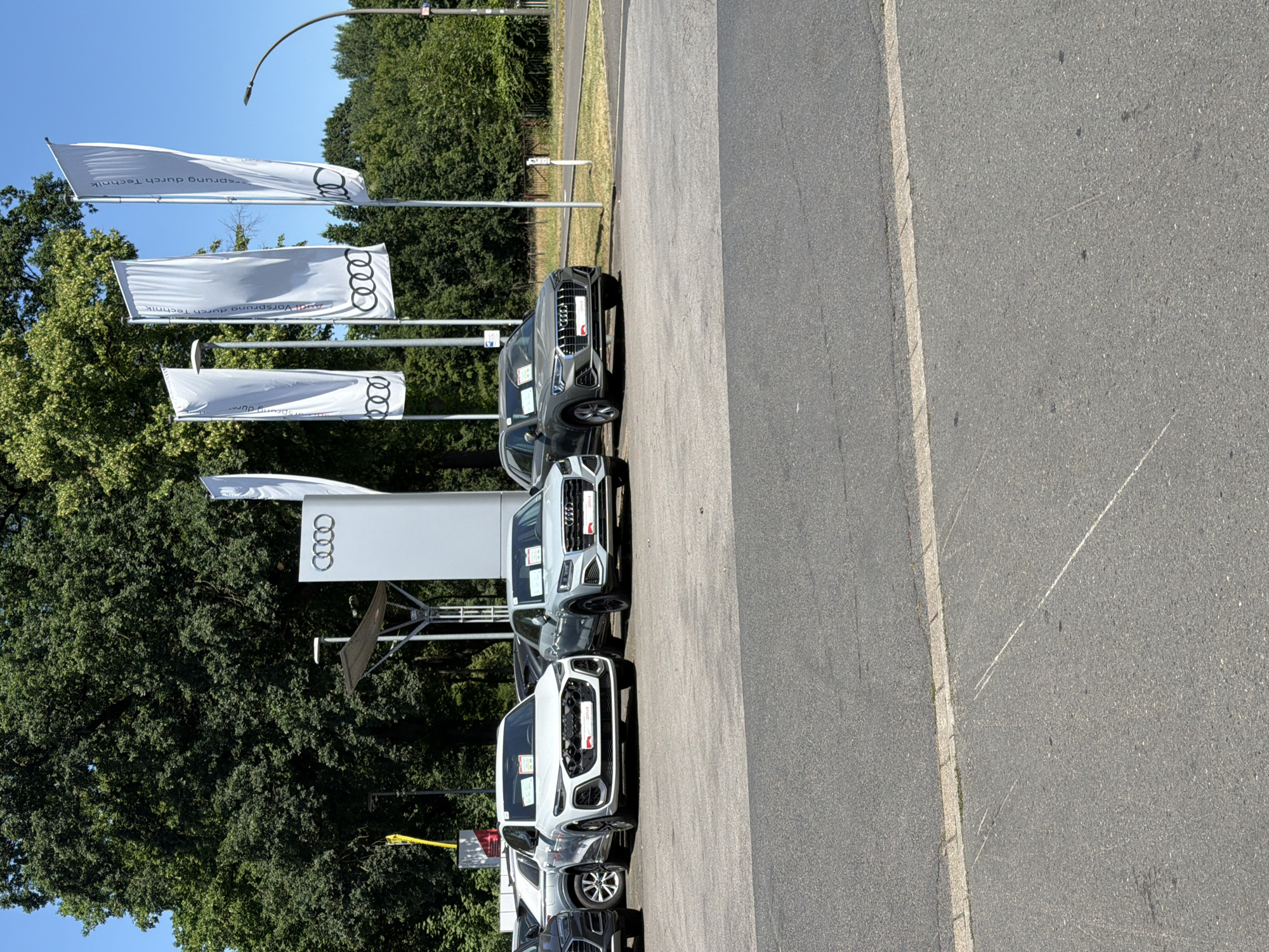 Audi dealership lot in Dorsten, cars lined up outside
