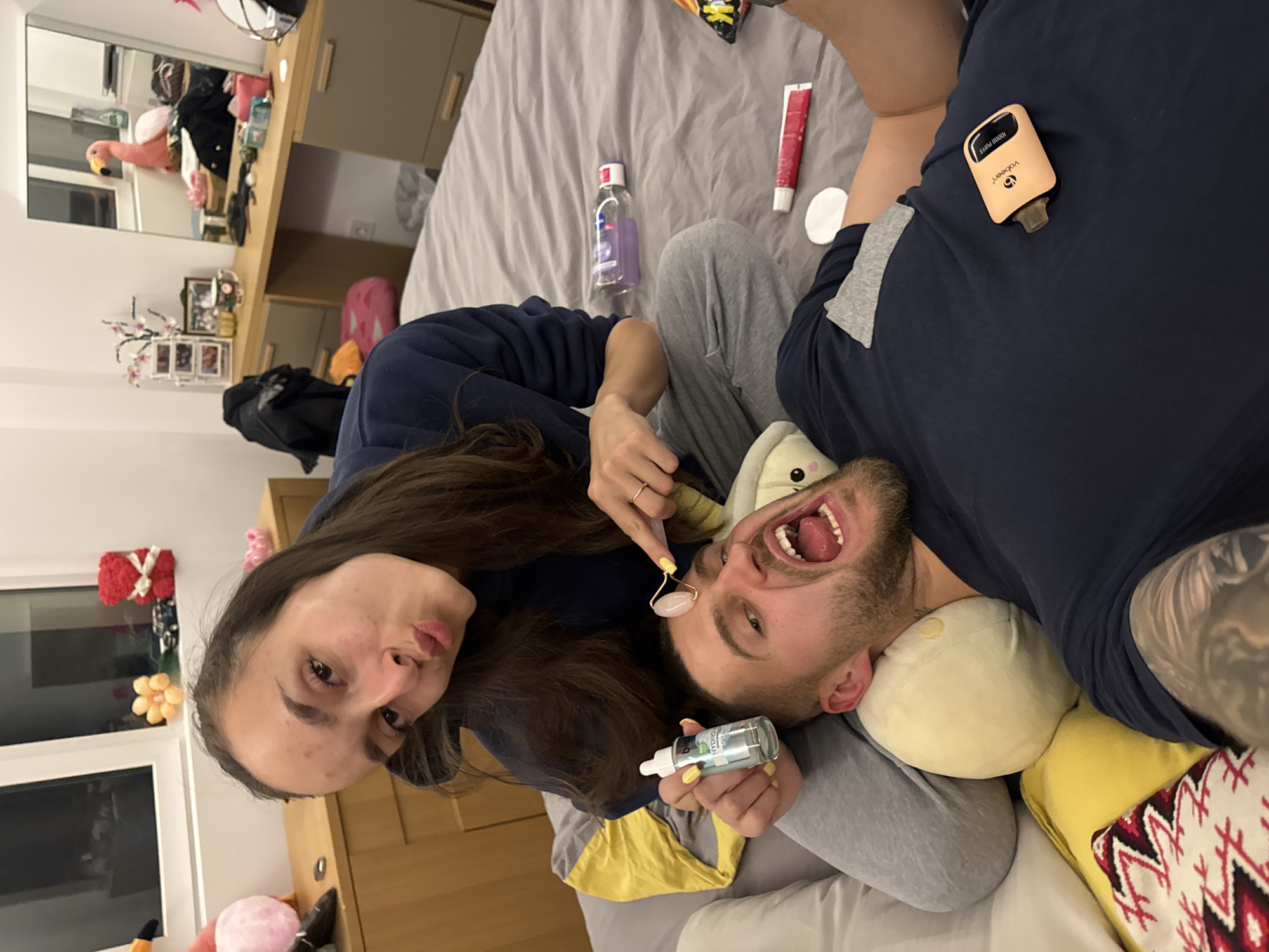 Couple shares skincare routine in Sofia bedroom