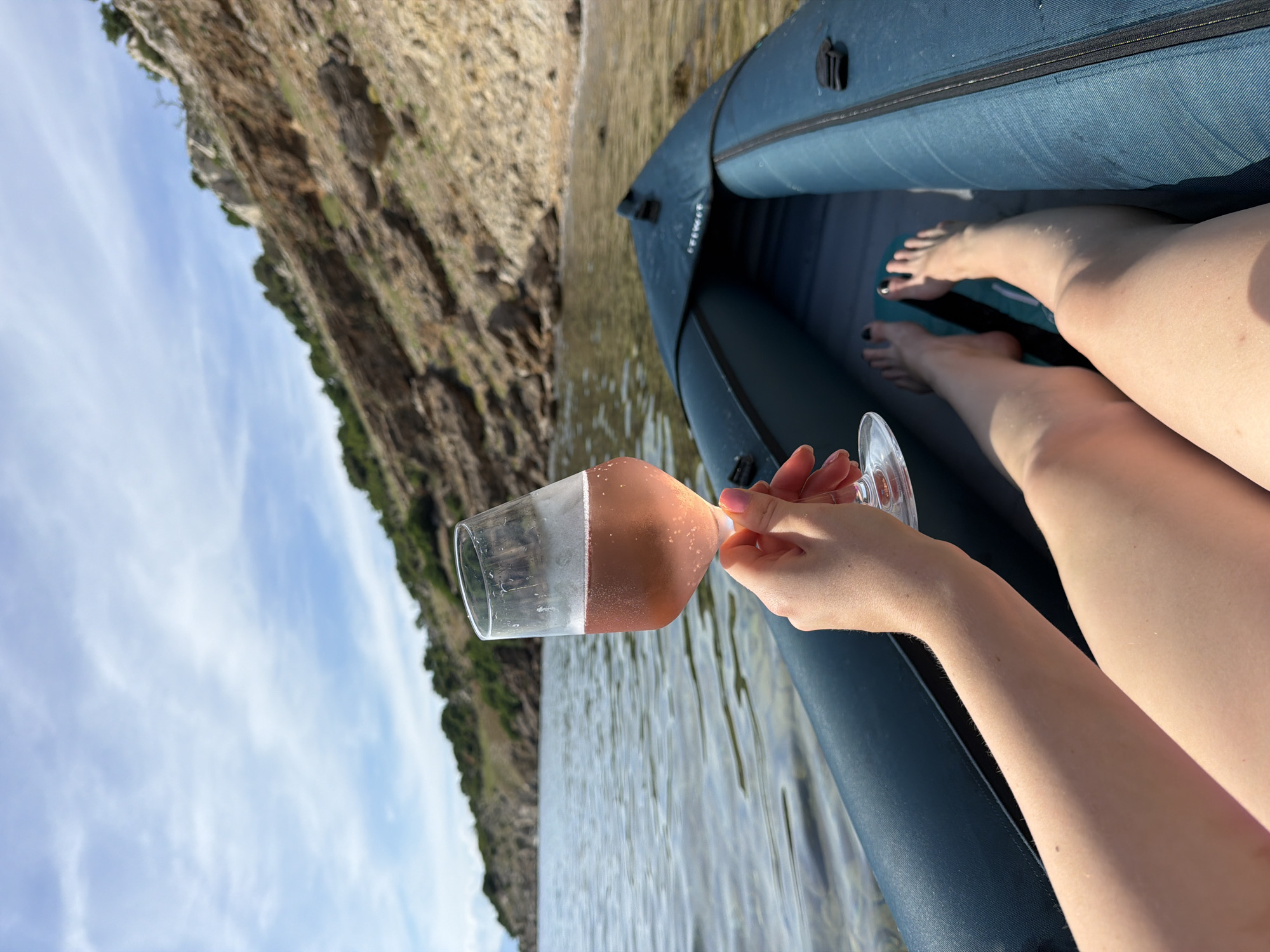 Beach day with kayaking, wine, and seashell collecting at scenic bay