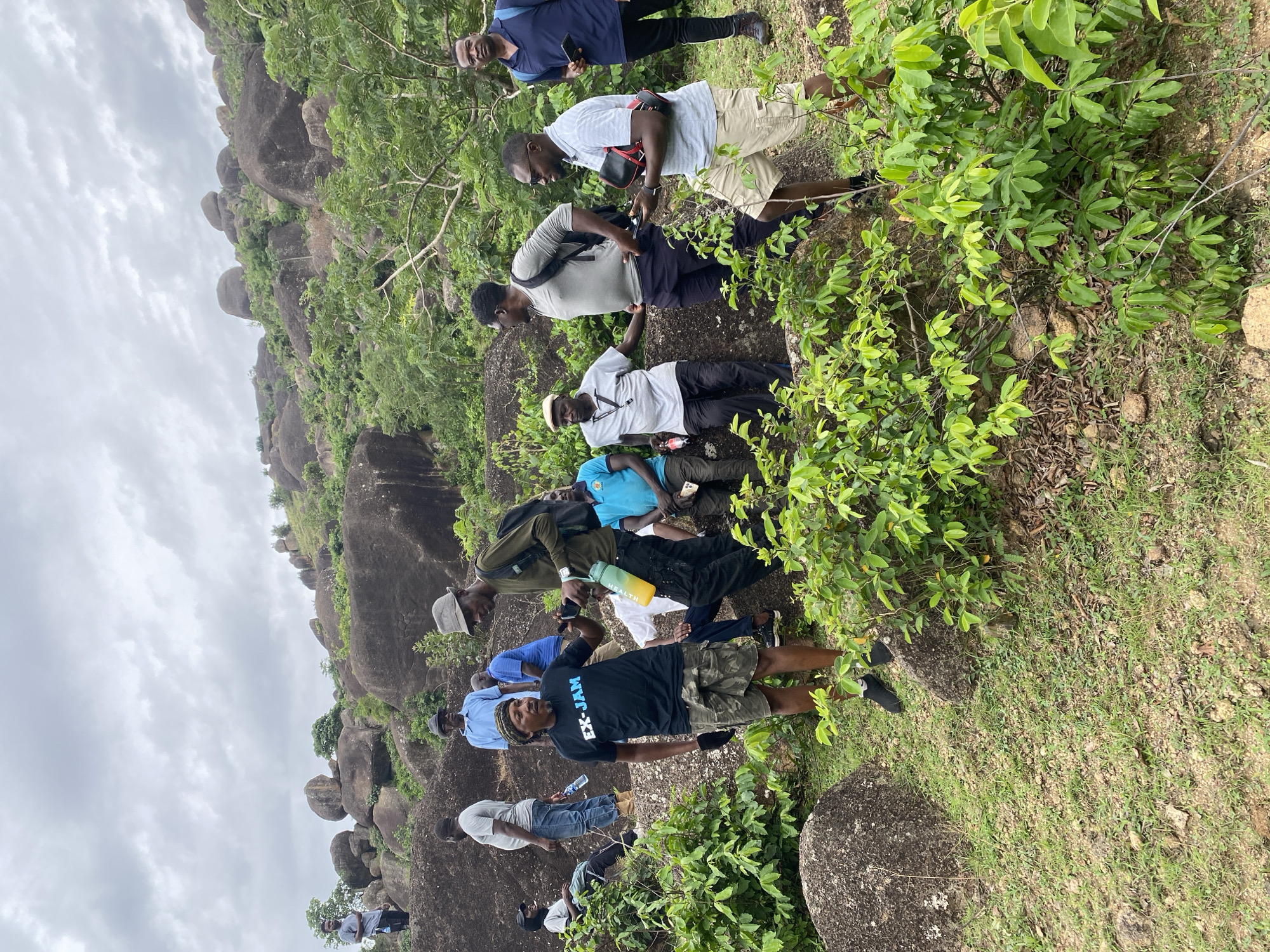 Hiking group explores rocky formations near Ganawuri, Nigeria