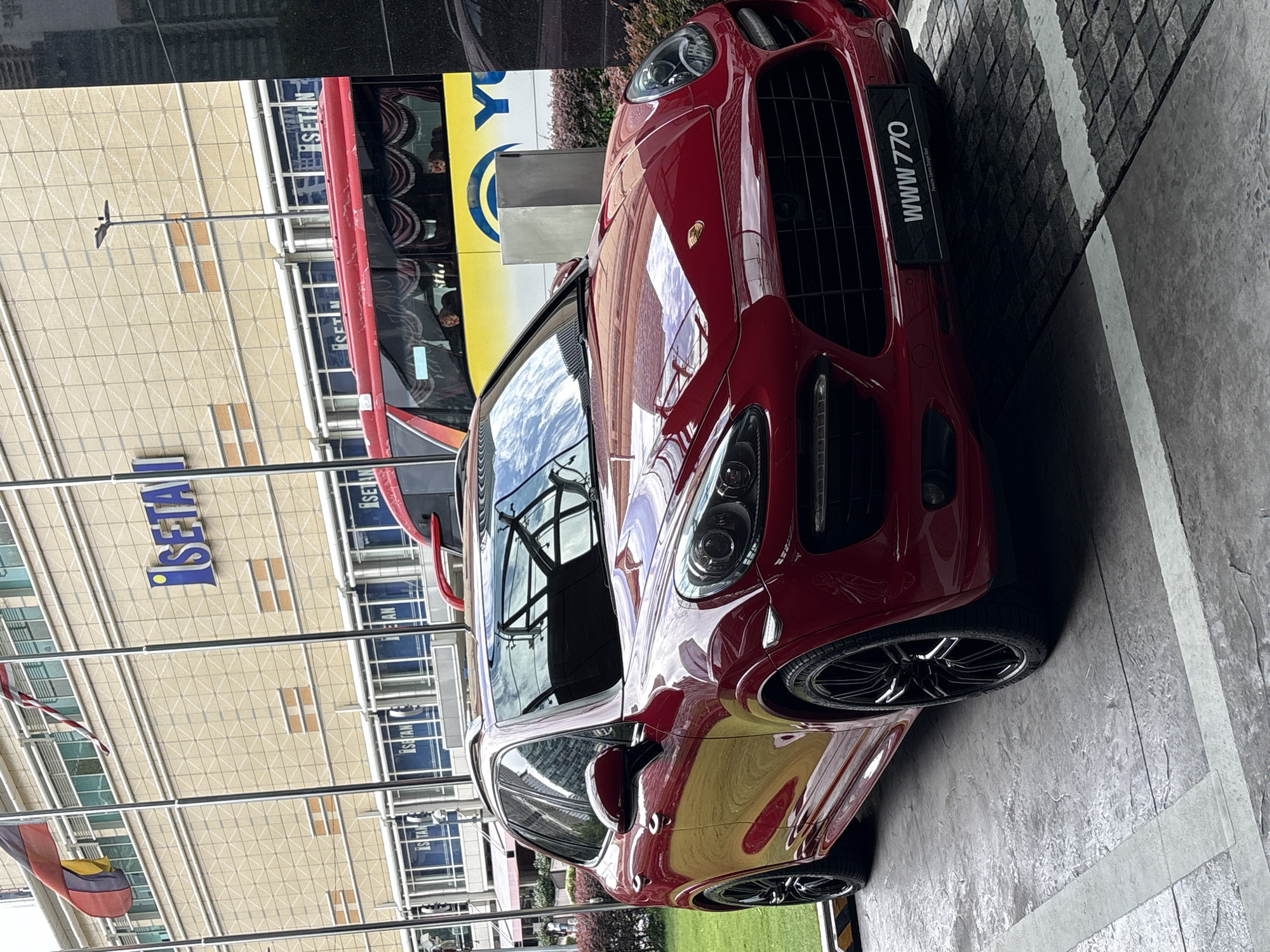 Red Porsche SUV spotted at multiple Kuala Lumpur locations