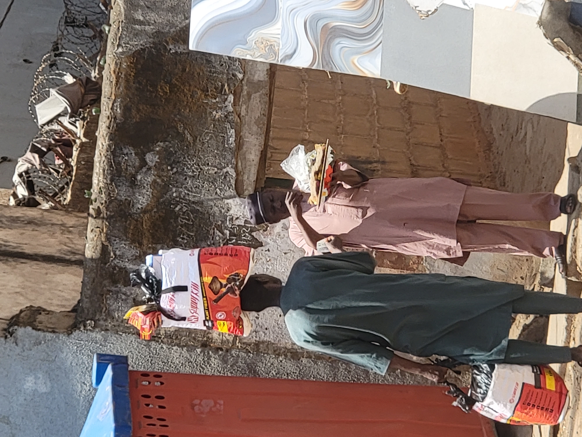 Daily street commerce documented in Maiburiji, Nigeria morning hours