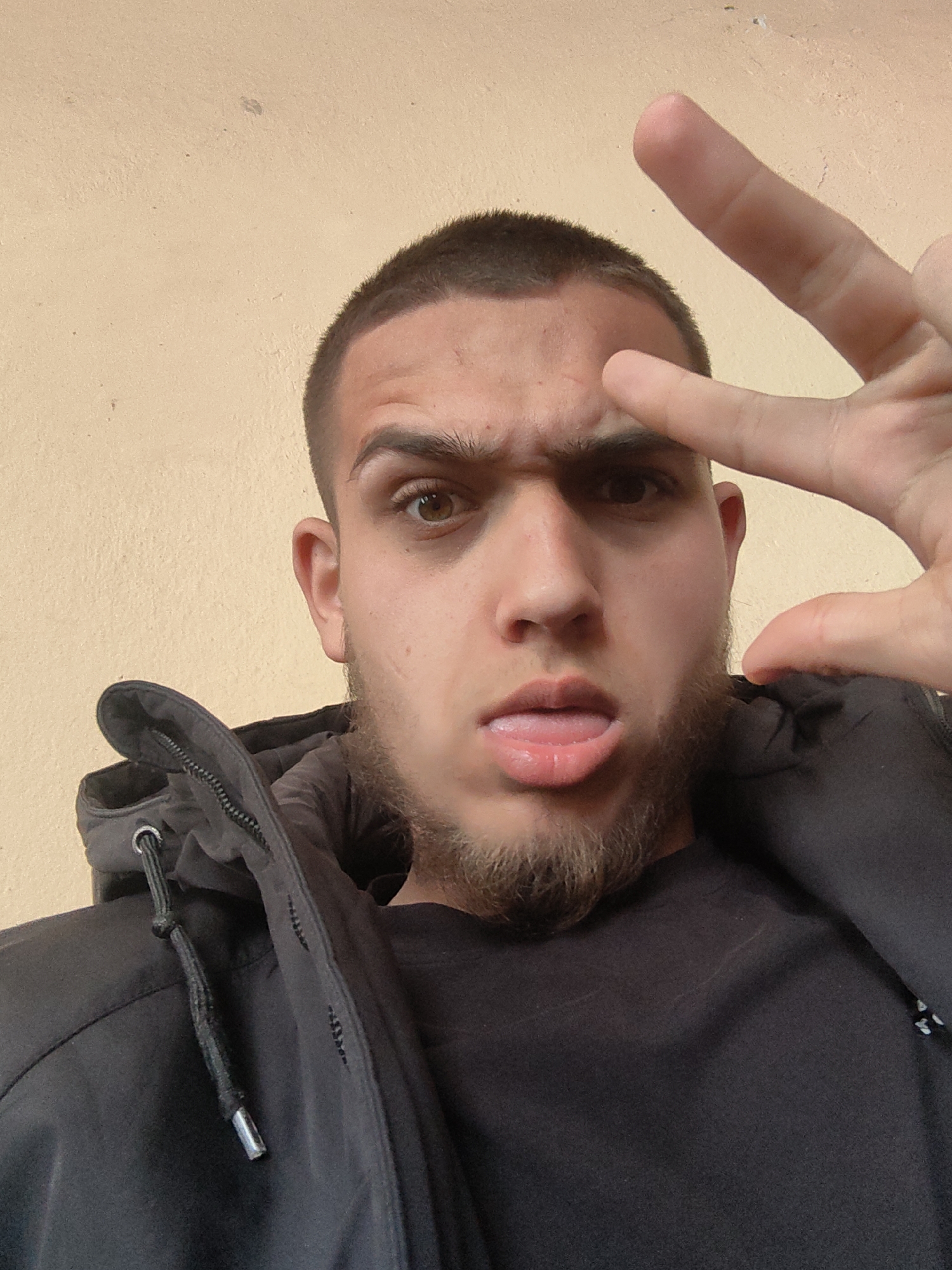 Young man photographs himself with juice in Bulgarian town