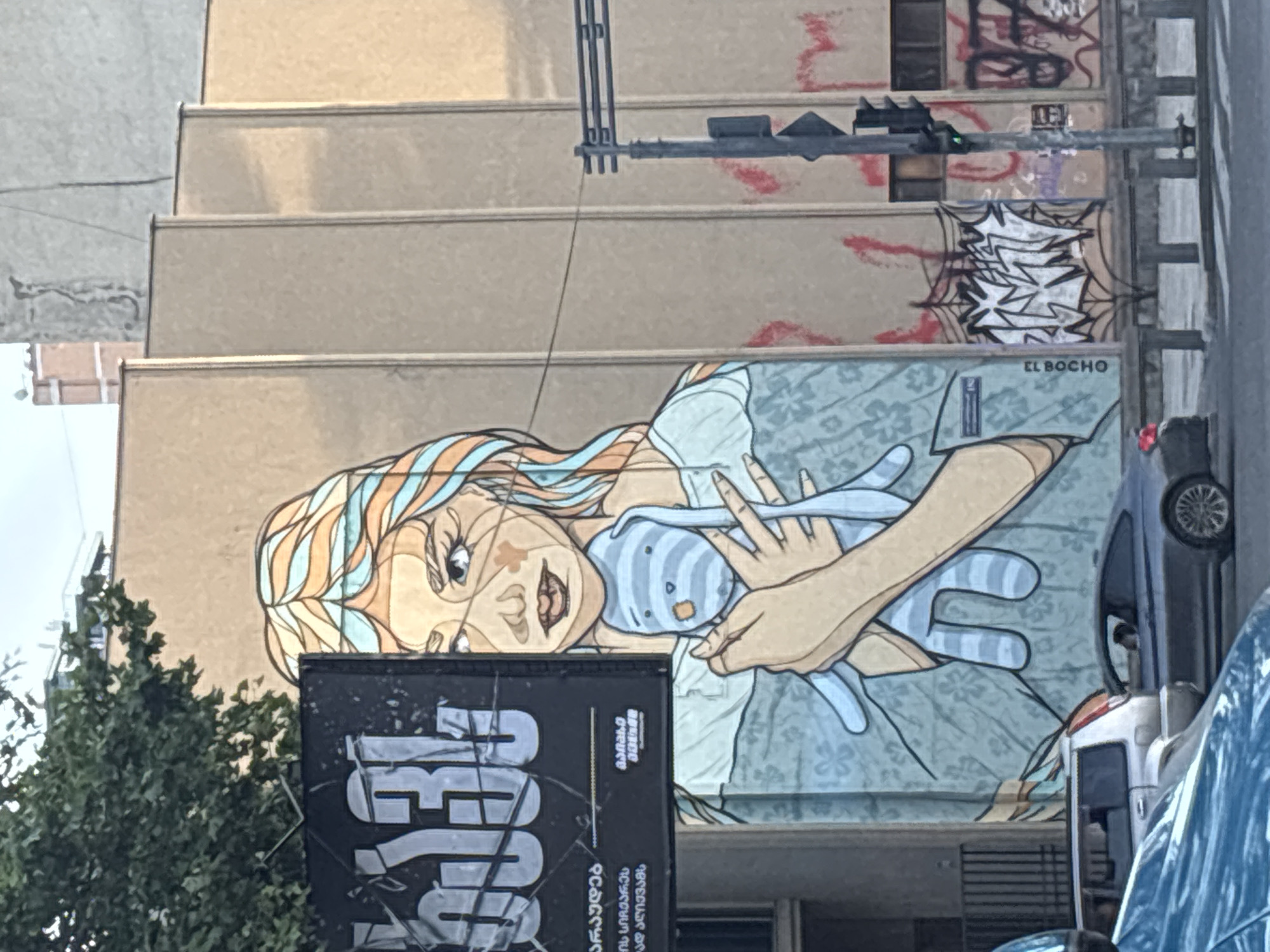 Tbilisi street art and public sculpture on a June afternoon
