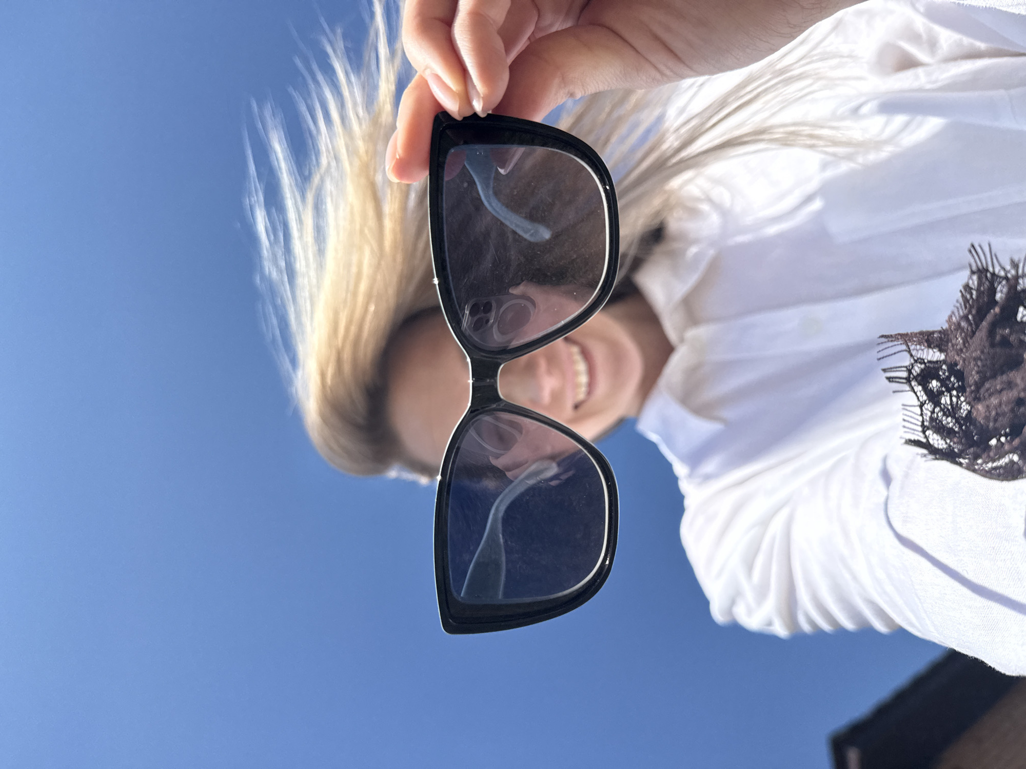 Woman poses for photos in sunny morning in Chaikovsky