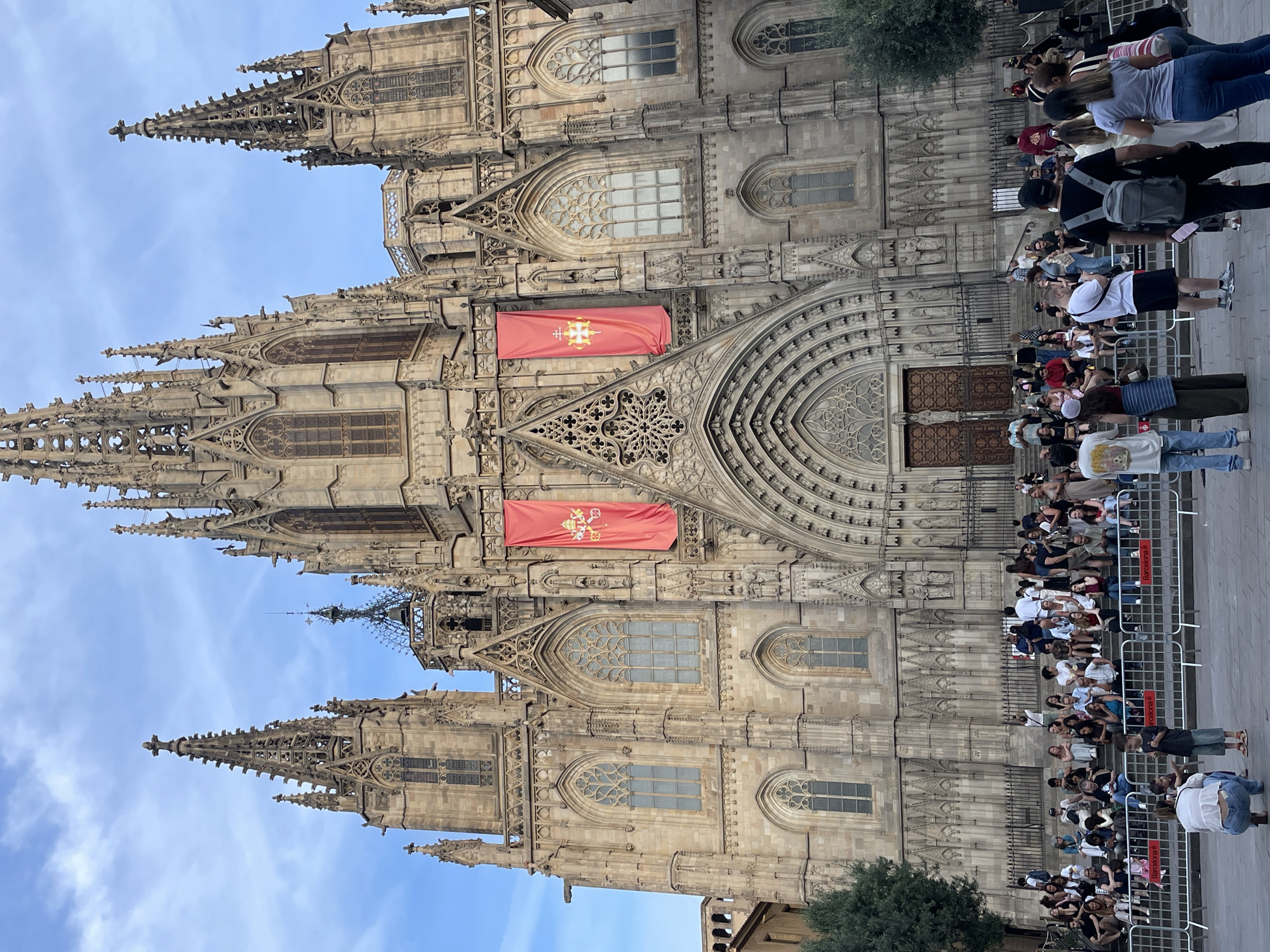 Barcelona Cathedral Gothic facade observed under cloudy skies