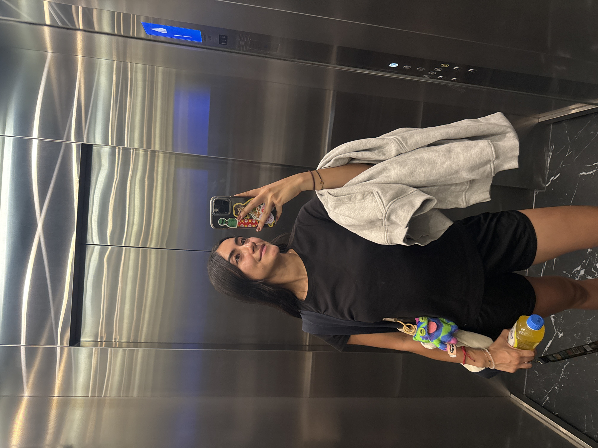 Woman takes elevator selfies in Puebla, Mexico