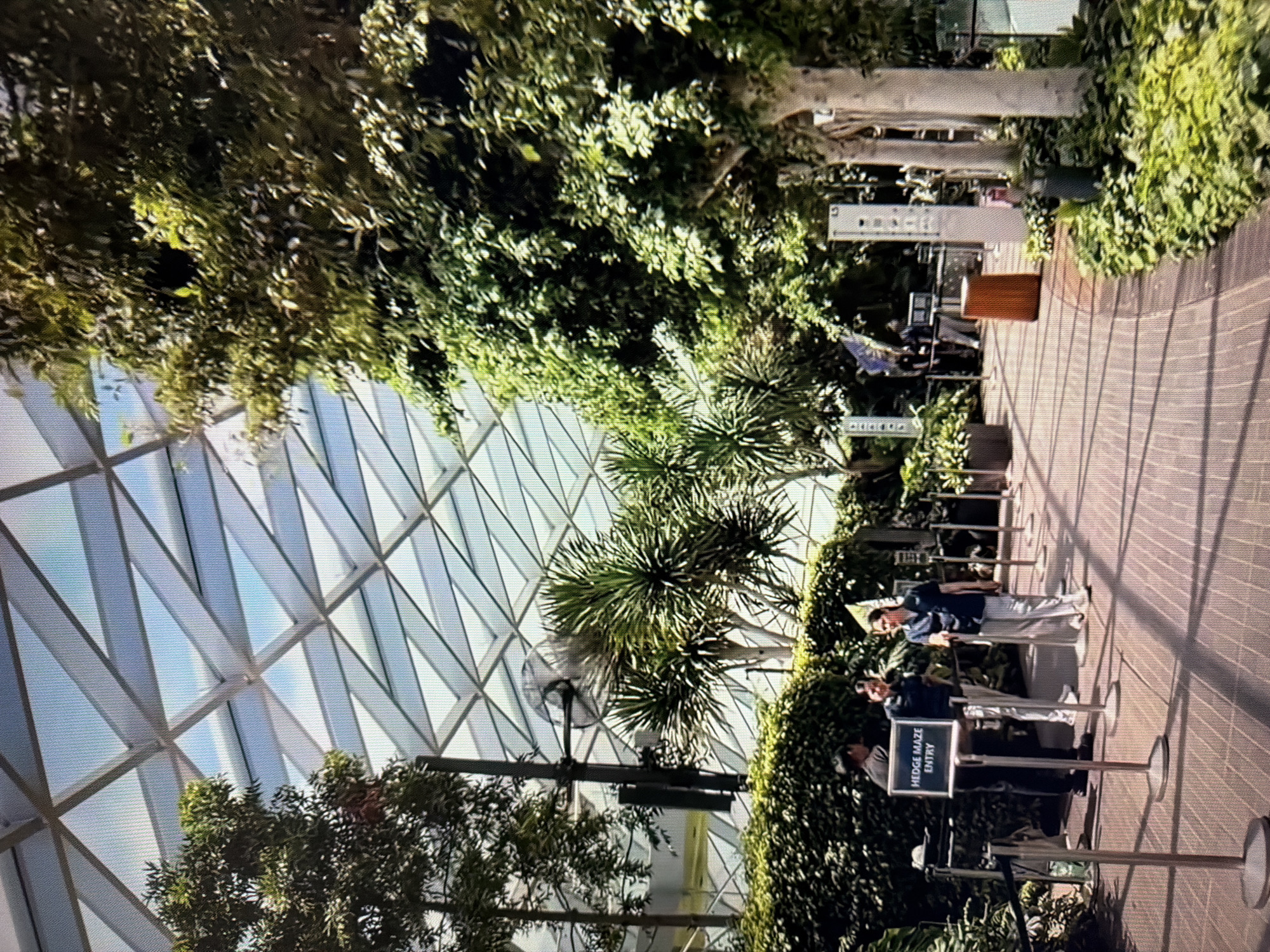 Inside Rostov-on-Don's geodesic dome mall with monorail and waterfall