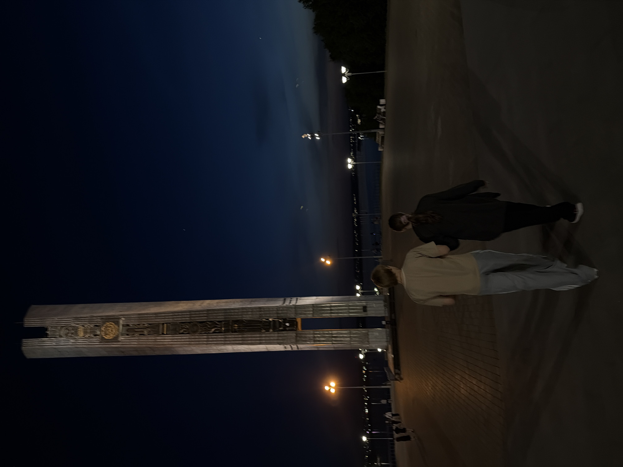 Evening visitors document landmarks across Izhevsk, Russia