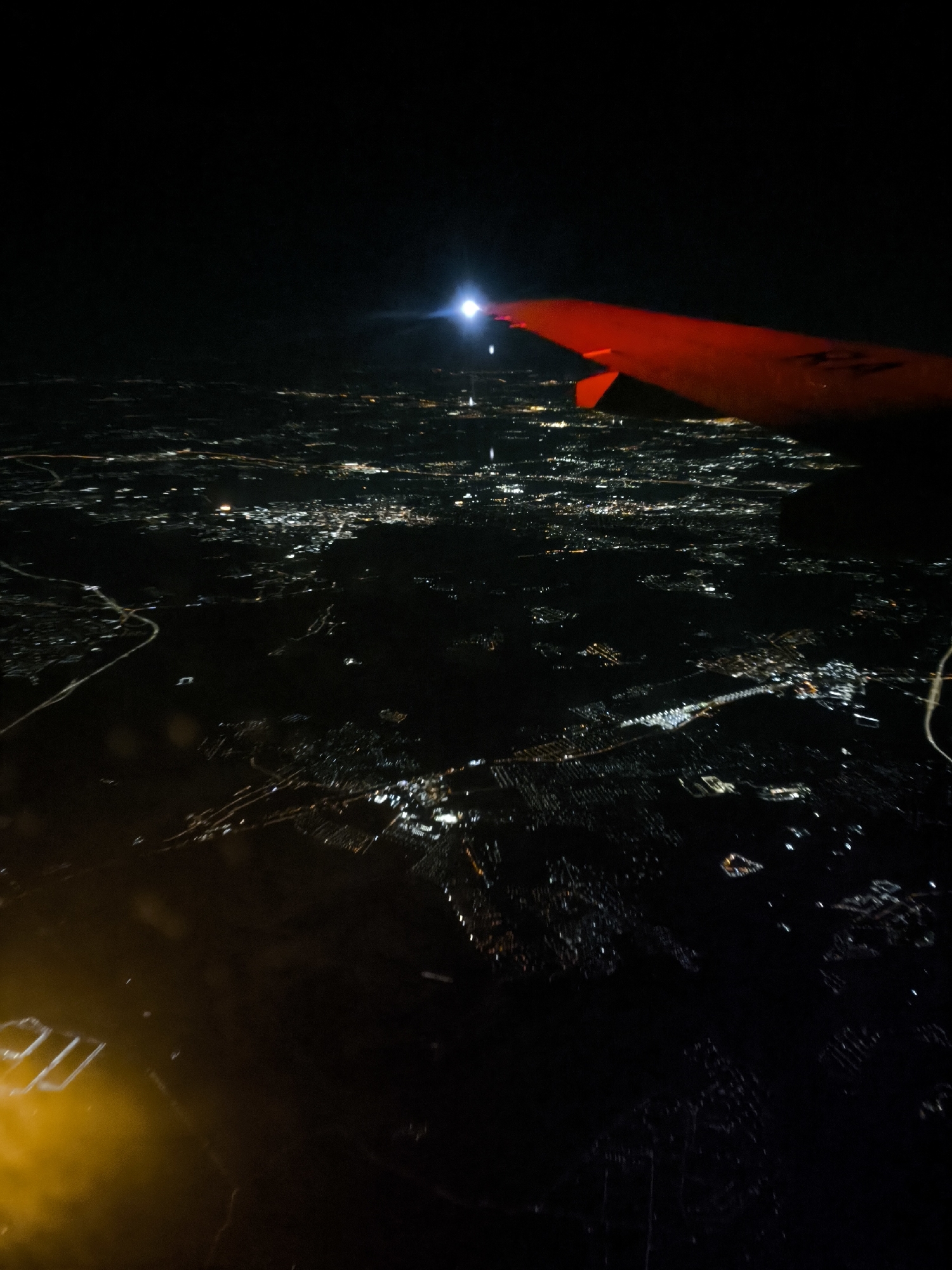 Night flight over Khimki captures city lights from aircraft