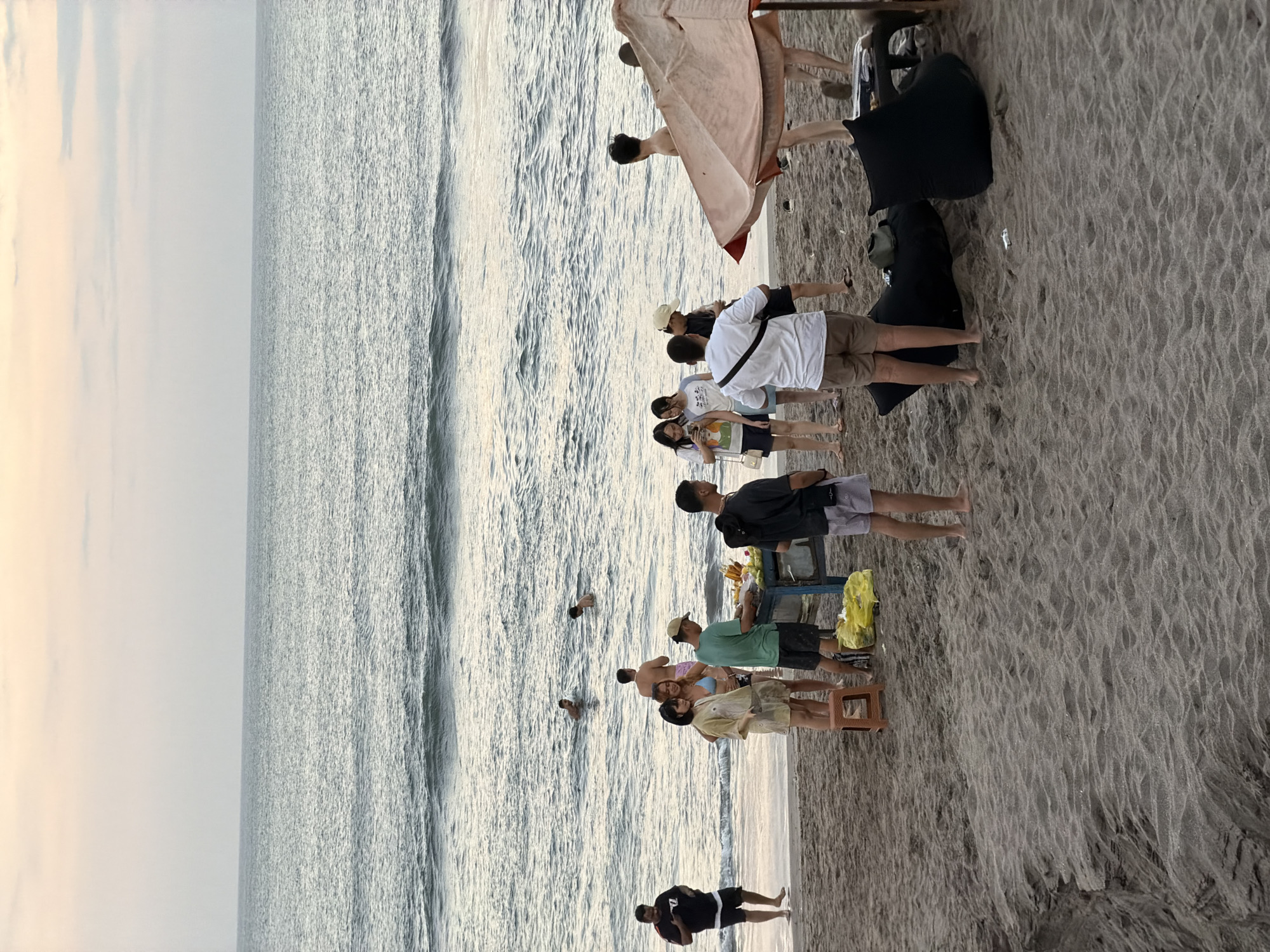 Beach and street life mix along North Kuta's shoreline